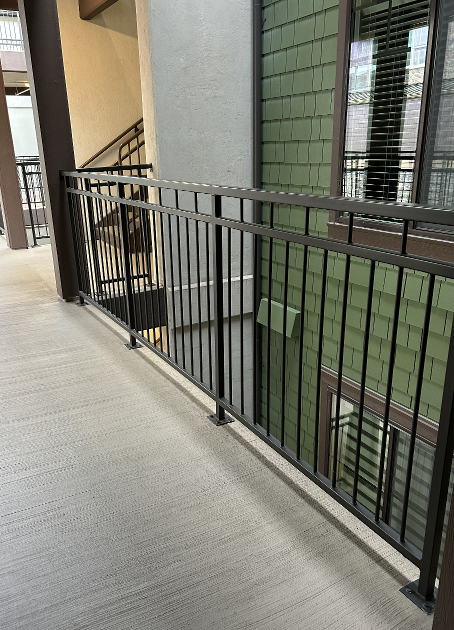 Modern exterior metal railing system with clean powder-coated design