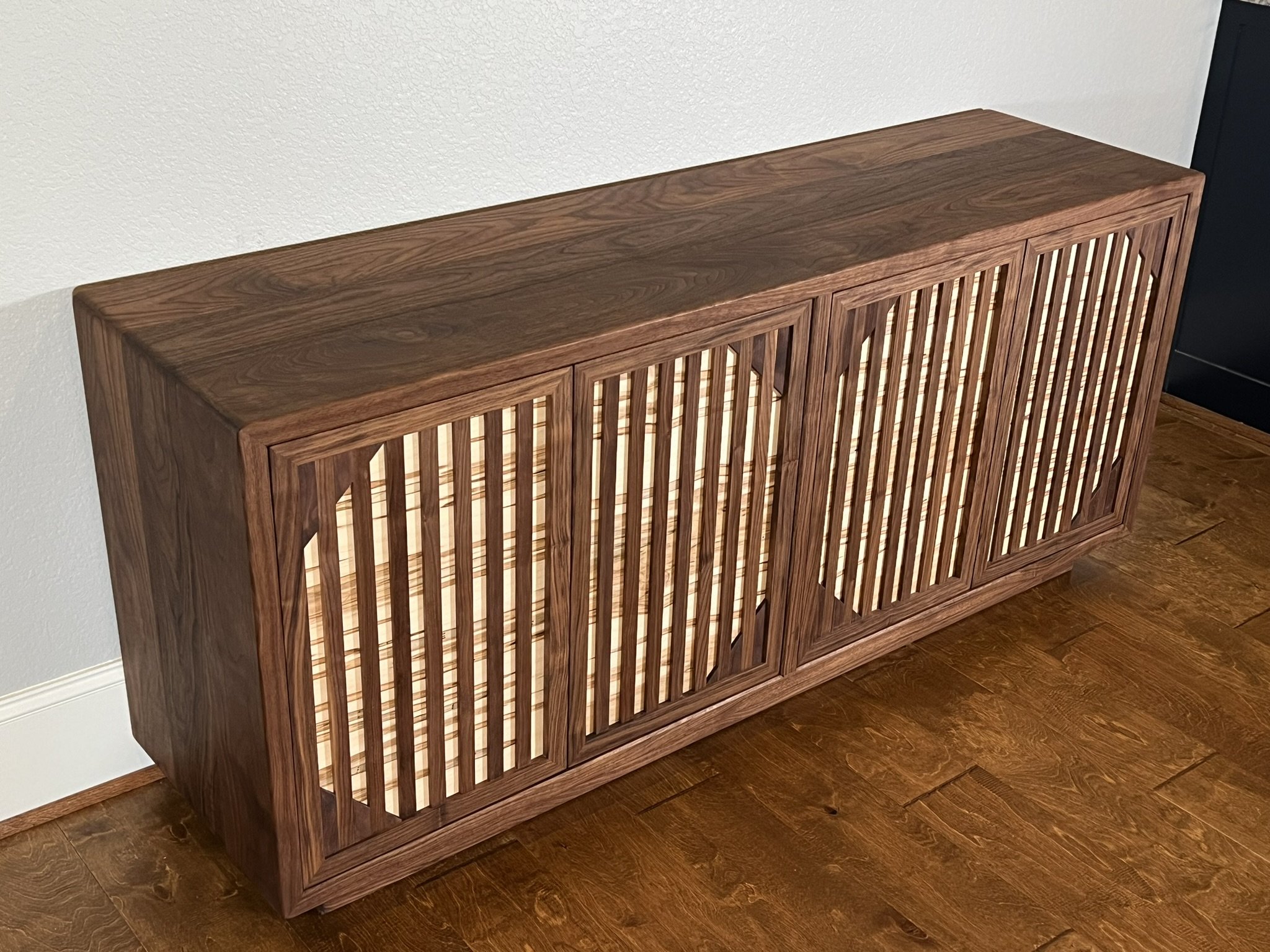 Custom sideboard made with walnut and ambrosia maple.