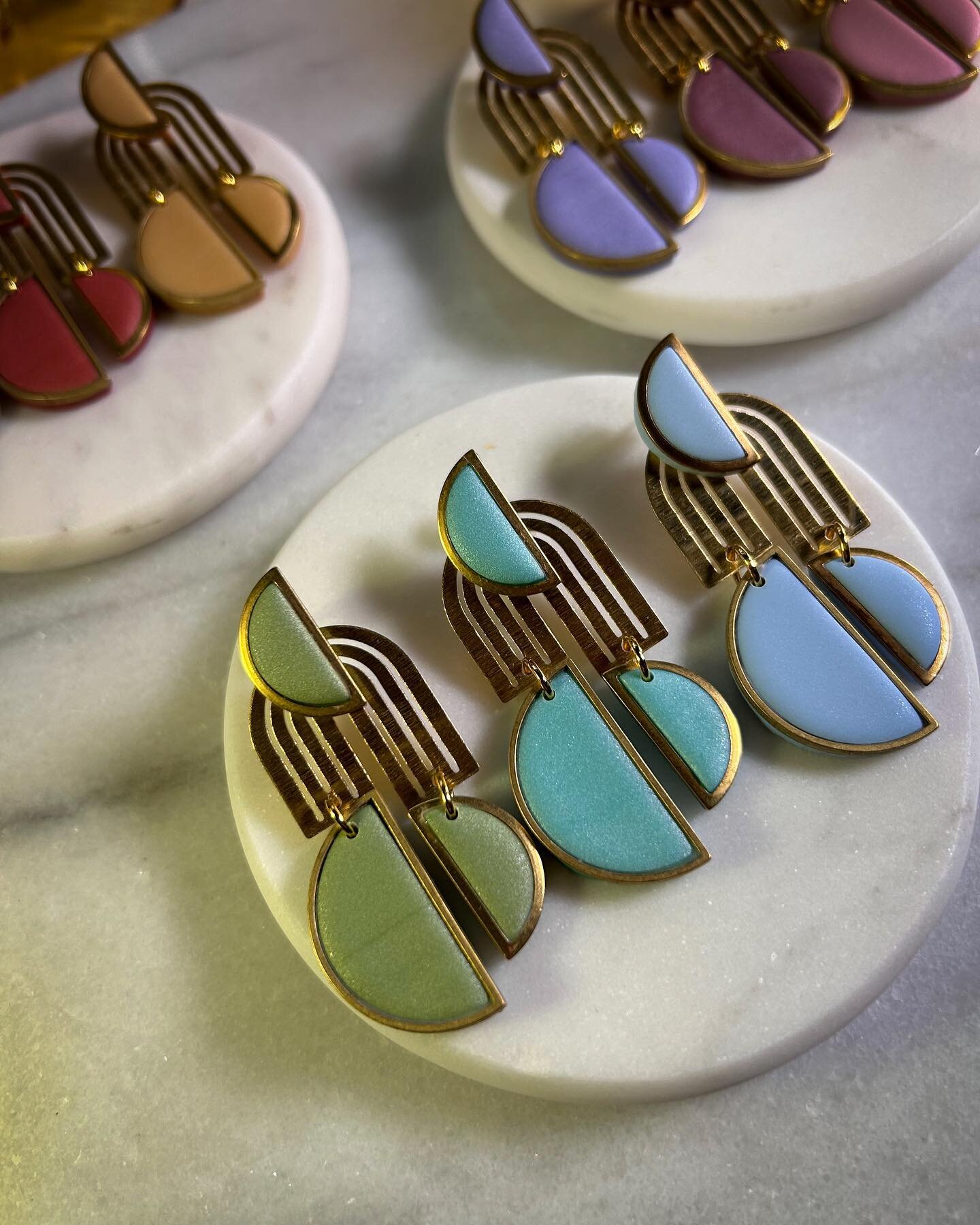 Introducing The Amaryllis earrings 😍😍 The 9 colors pictured here represent the new pastel color line and just 1 of 25 signature styles that will be launched on the website starting Friday at 12pm EST! Of the 25 signature styles 17 of them will be a