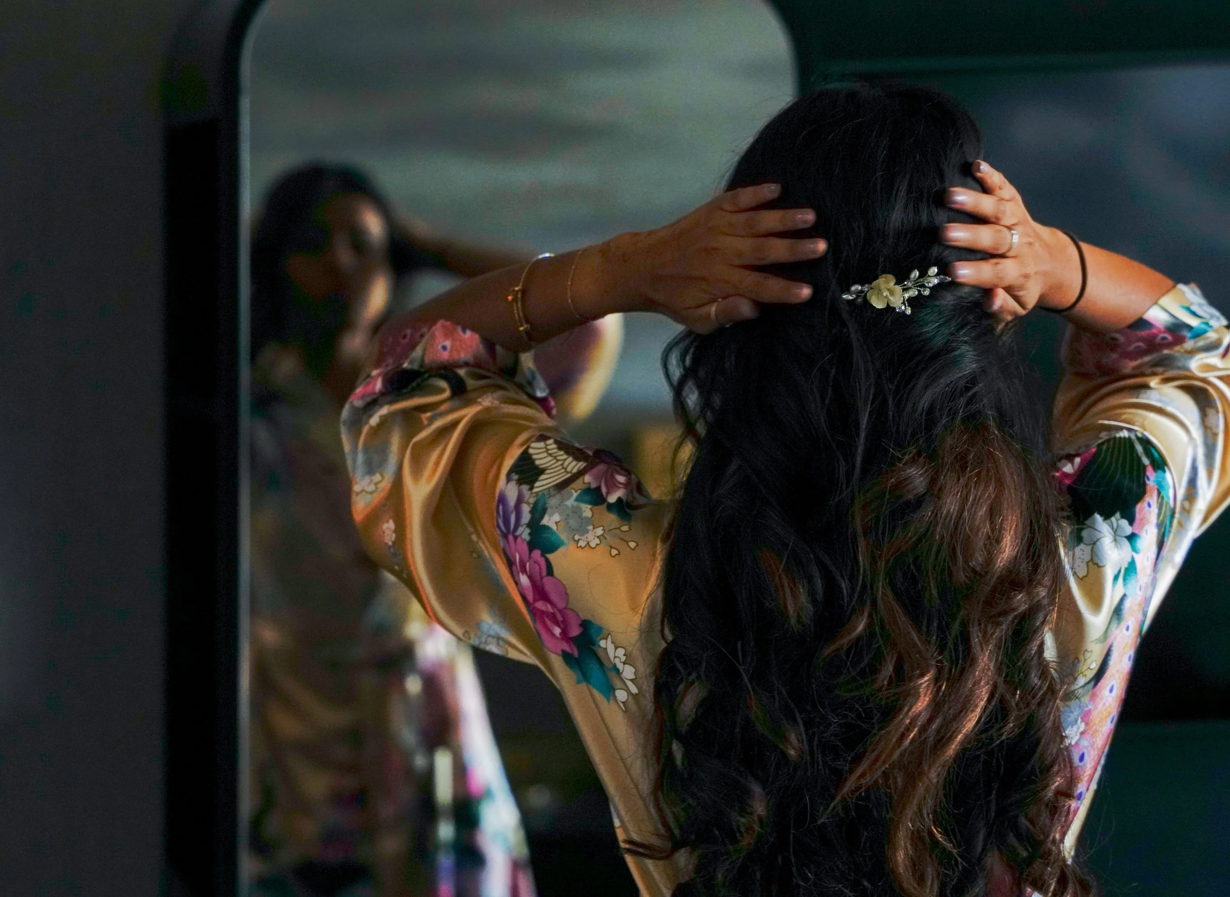 bridesmade fixing hair from behind.jpg