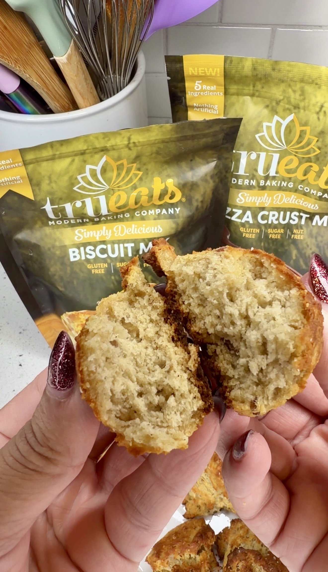 Freshly baked TruEats biscuit broken open to show the soft interior