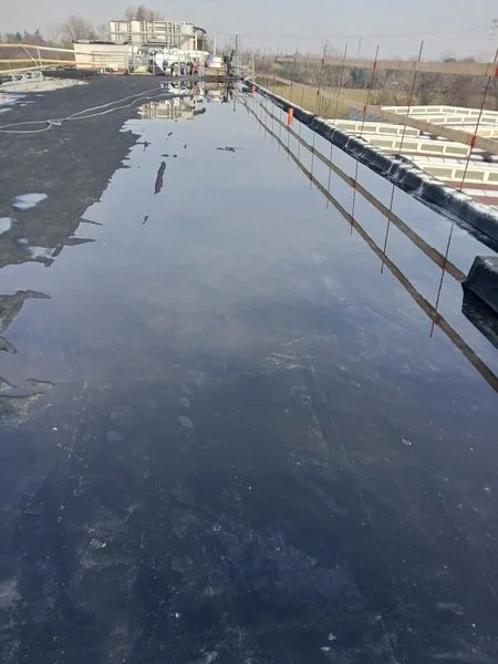 Impermeabilizzazione e collaudo di tetto industriale a Cusago: posa di membrana EPDM Hidrostan per centro logistico