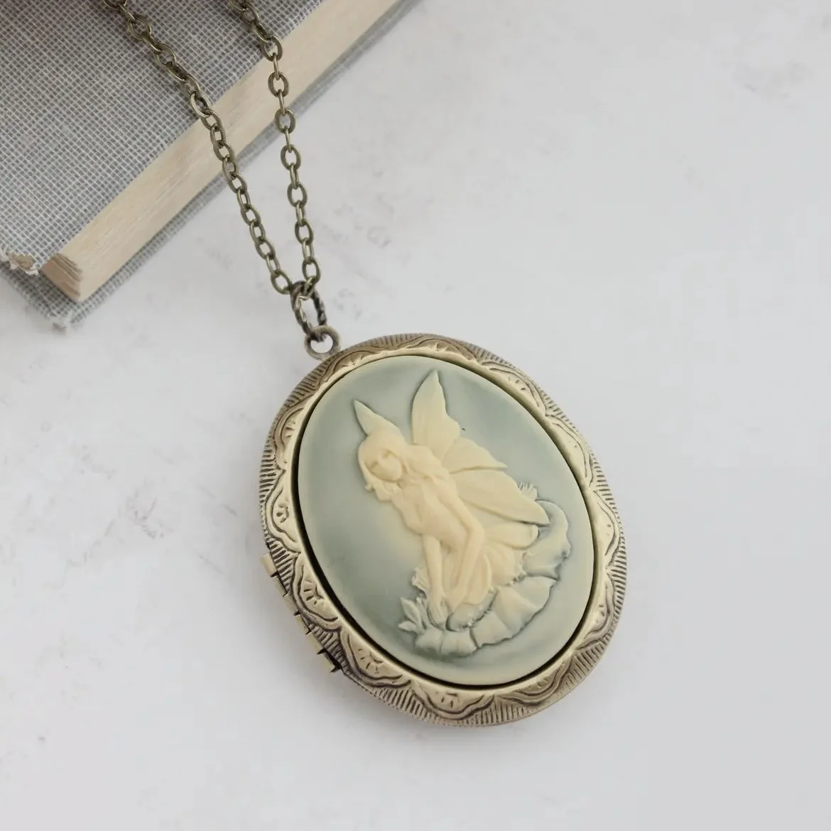 pocket-of-posies-fairy-cameo-locket-necklace-art-and-lace-1.jpg