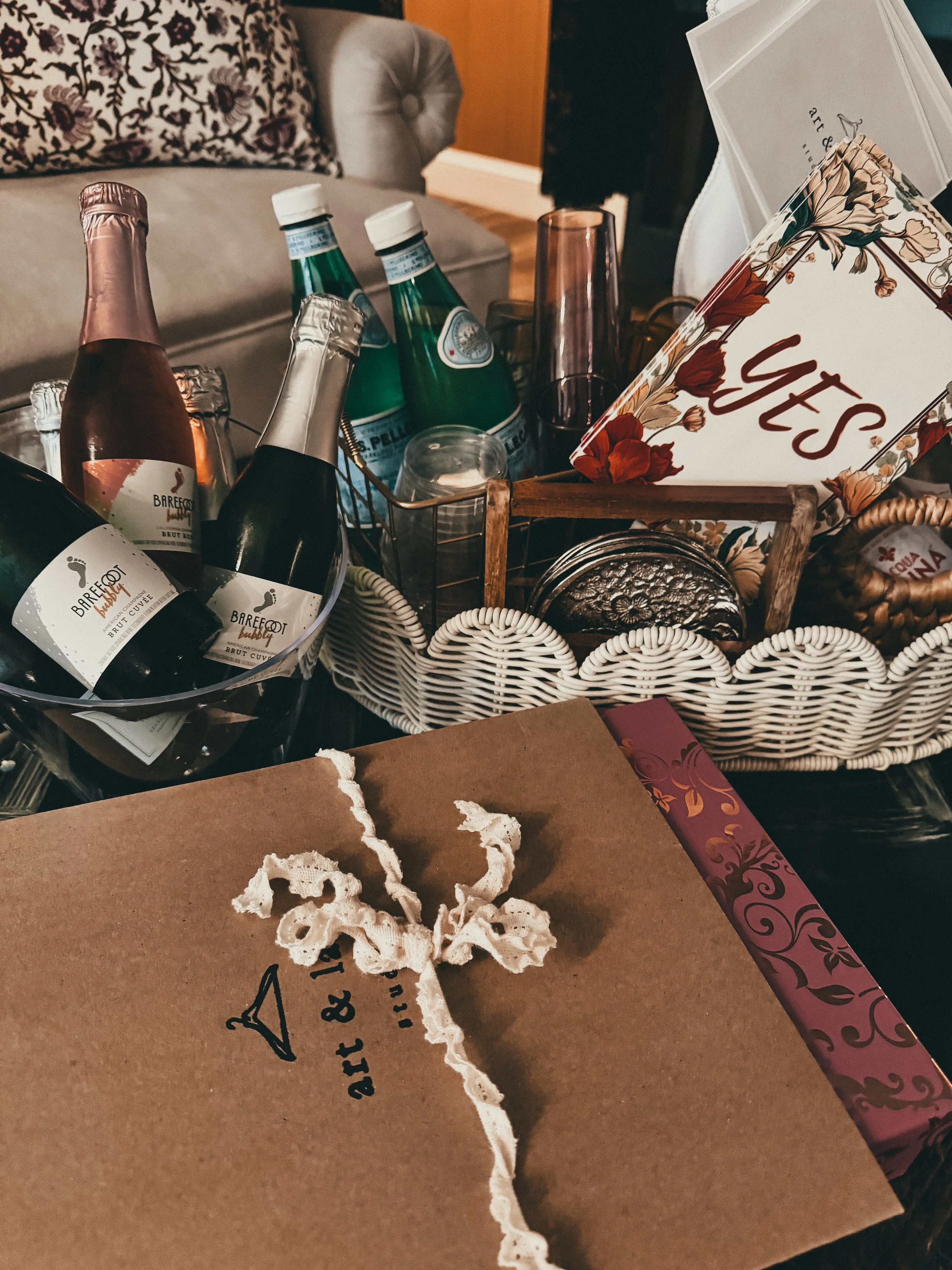 A curated welcome for the bride at Art & Lace — champagne, refreshments, and a signed keepsake gift bag included with every Signature Bridal Appointment.