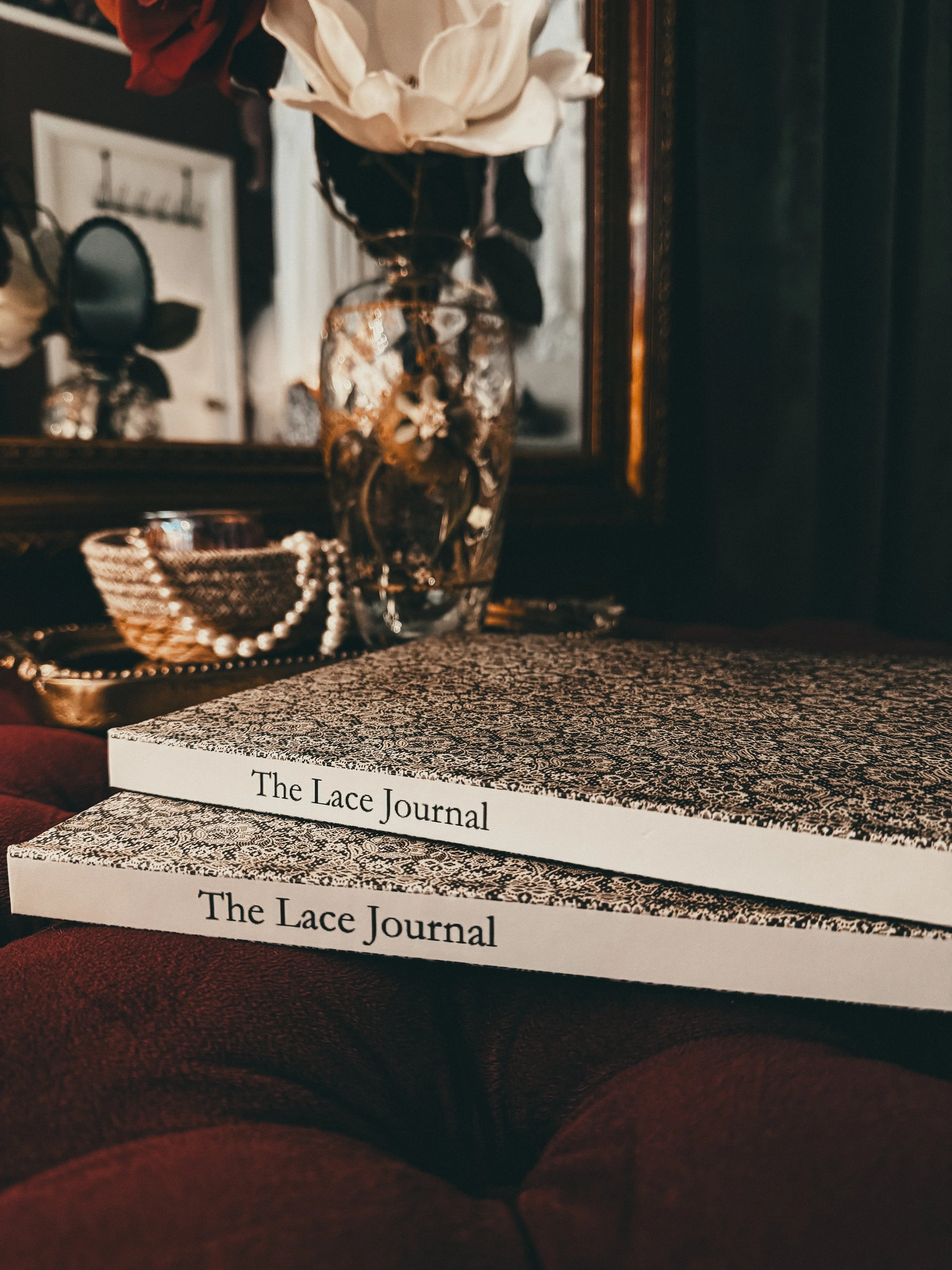 Alt text: The Lace Journal styled with vintage pearls and dried florals — a 154-page bridal aesthetic workbook by Samantha Almeida.