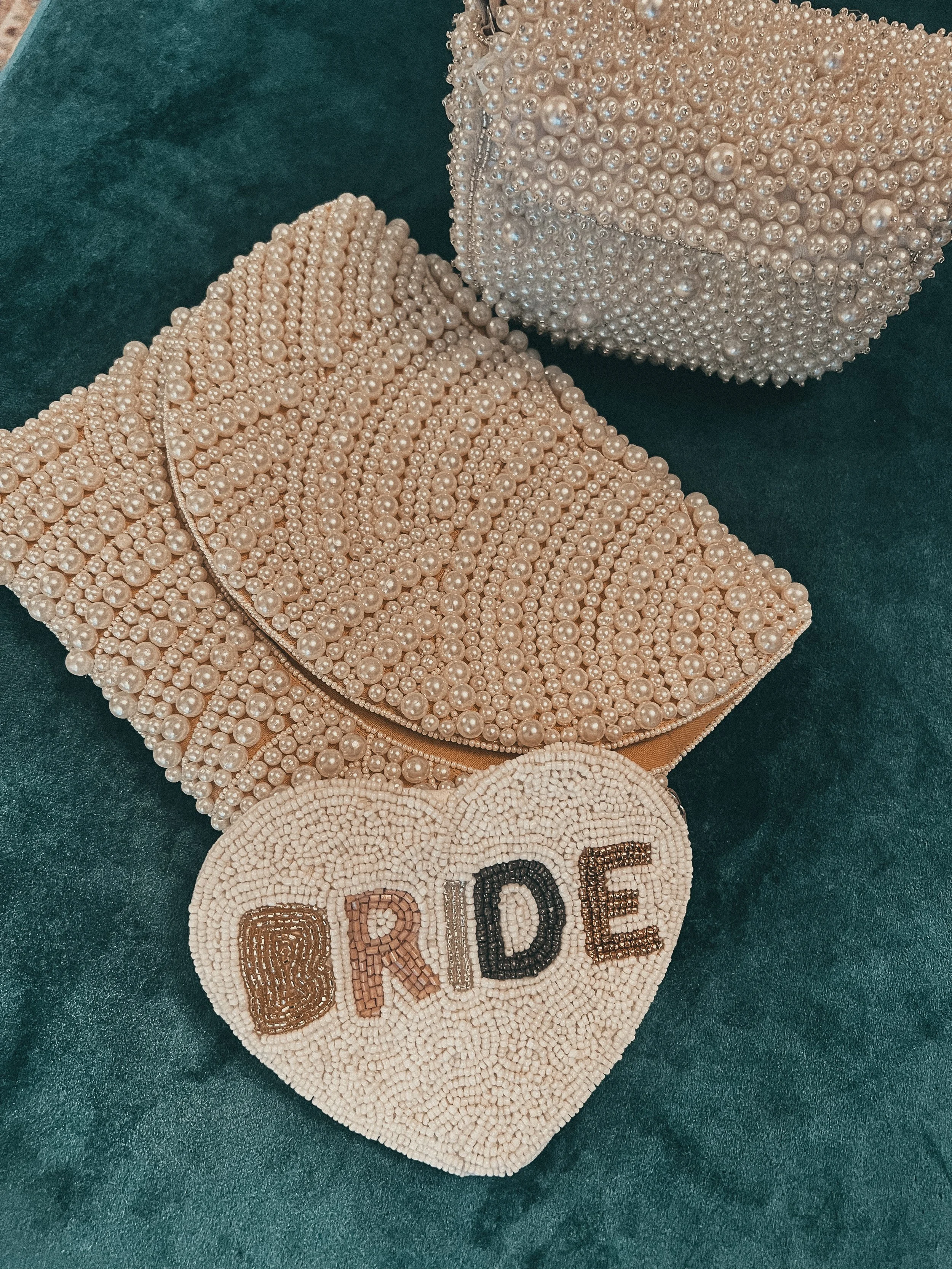 pearl-clutch-and-bride-pouch-collection-art-and-lace.jpg
