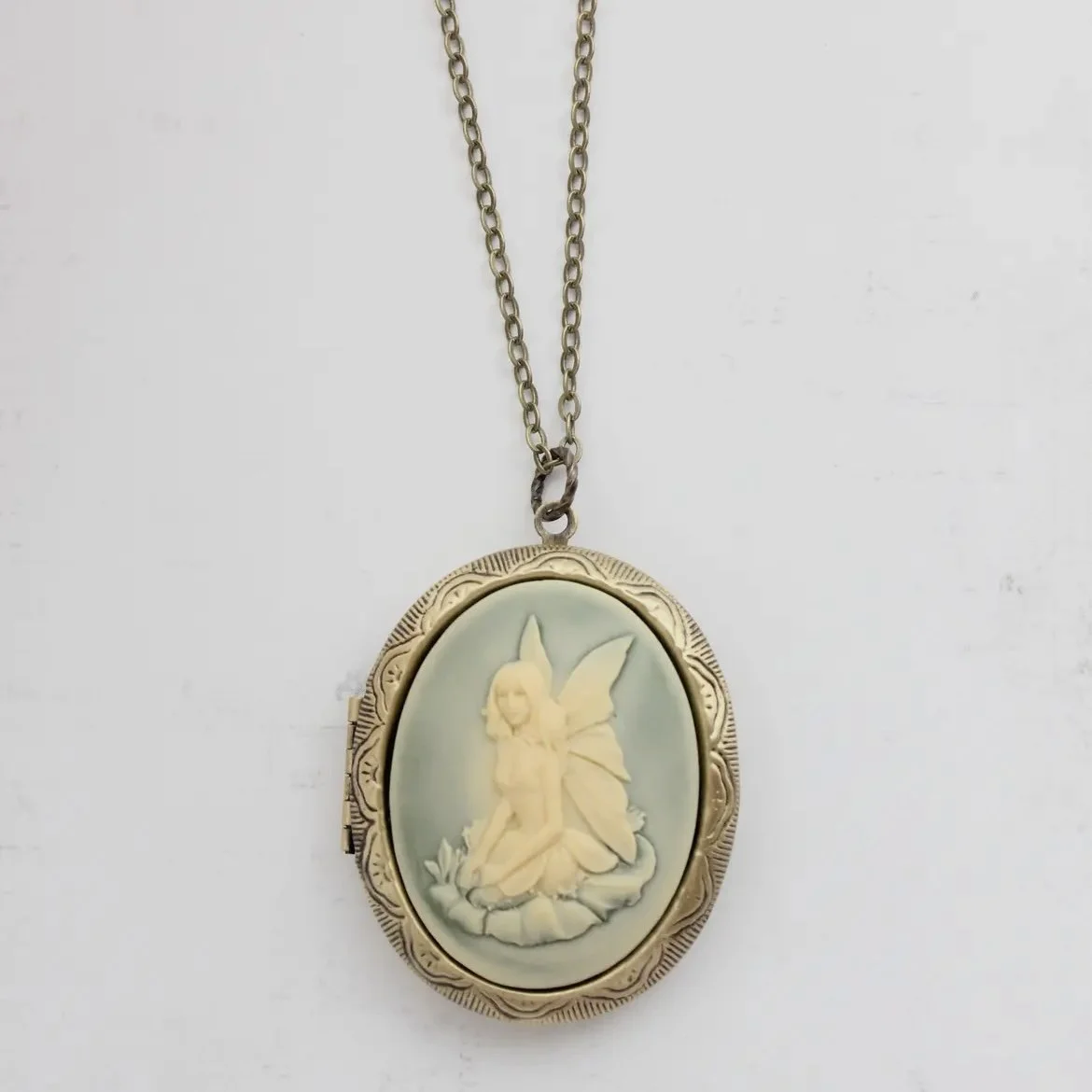 pocket-of-posies-fairy-cameo-locket-necklace-art-and-lace-2.jpg
