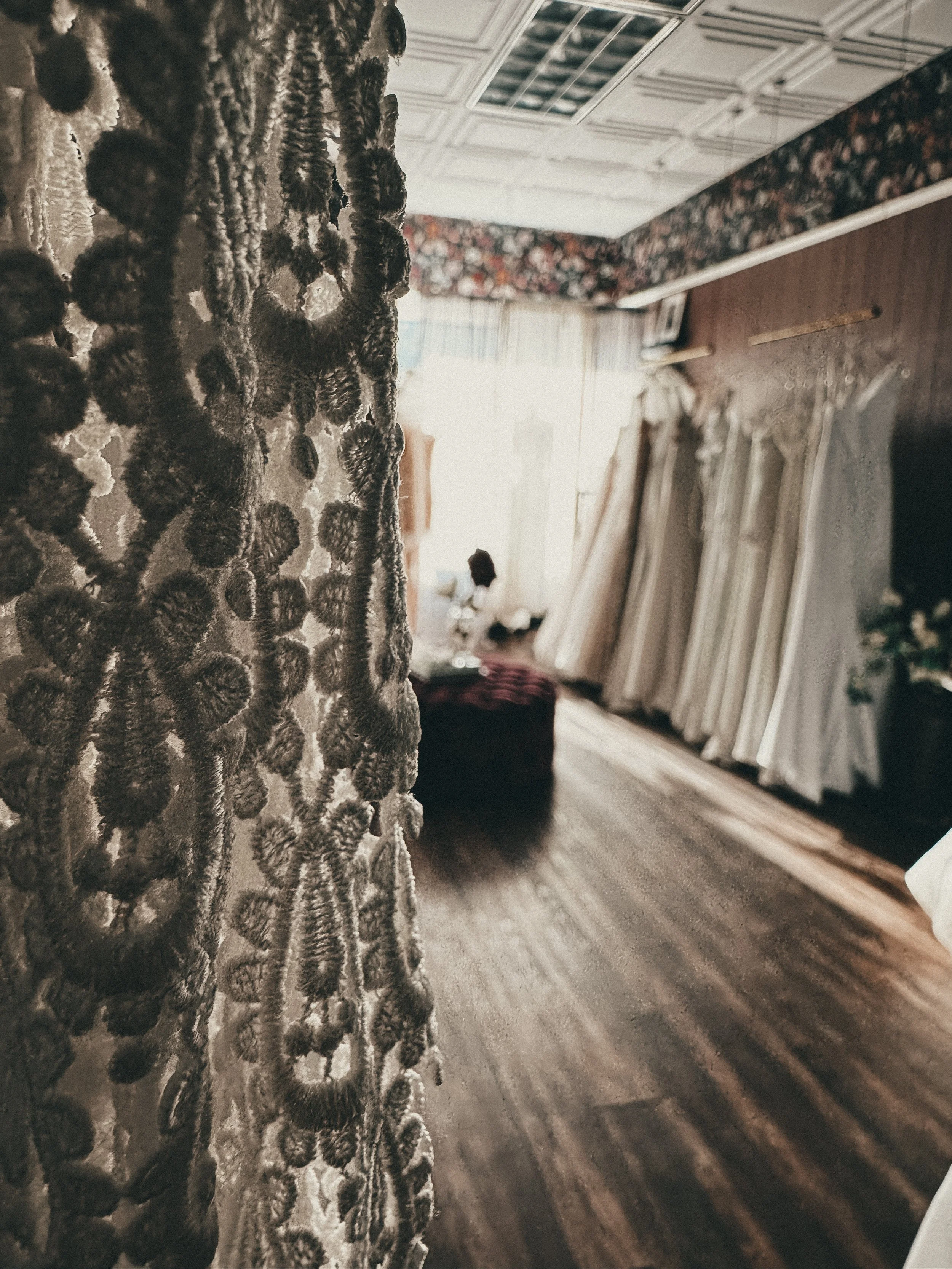 Handworked crochet lace detail on a vintage bohemian wedding gown at Art & Lace Bridal, Somerset, MA.