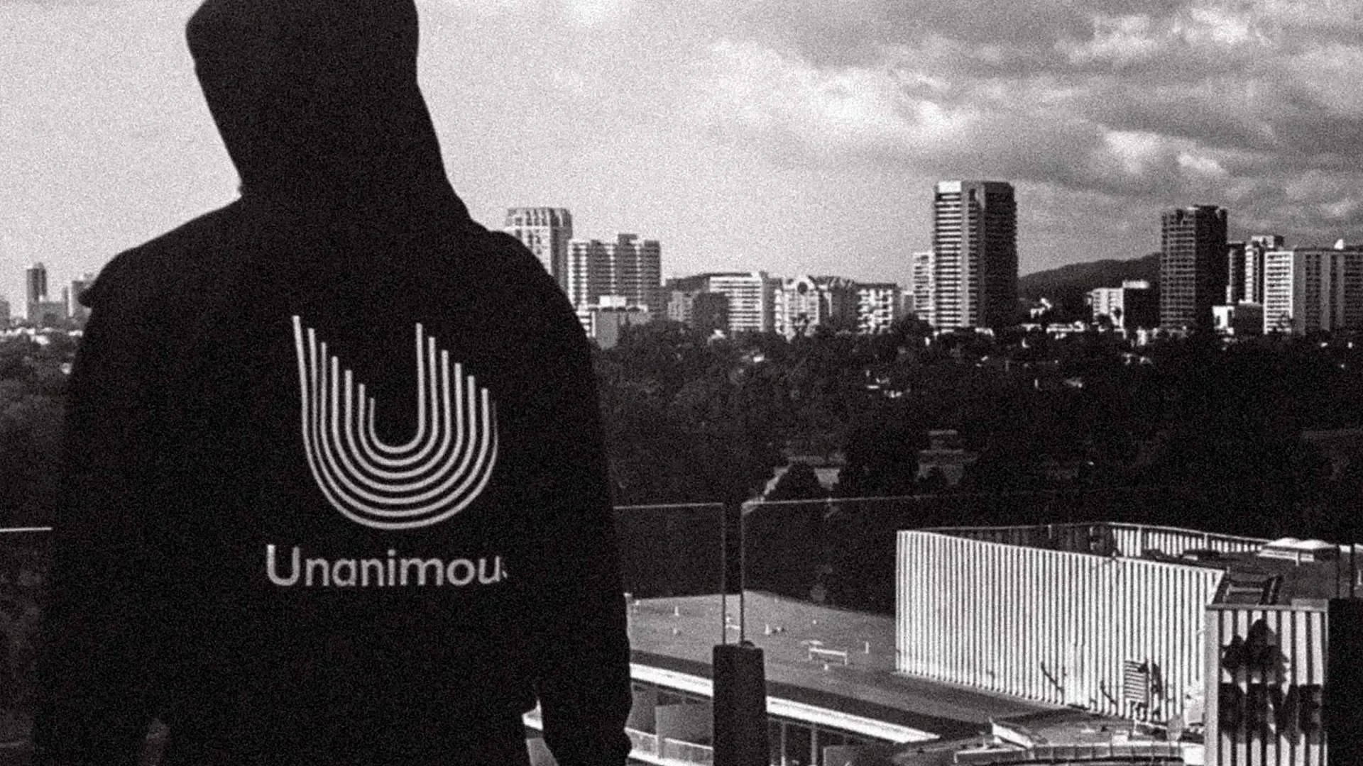 Unanimous Media lifestyle photo with branded merch