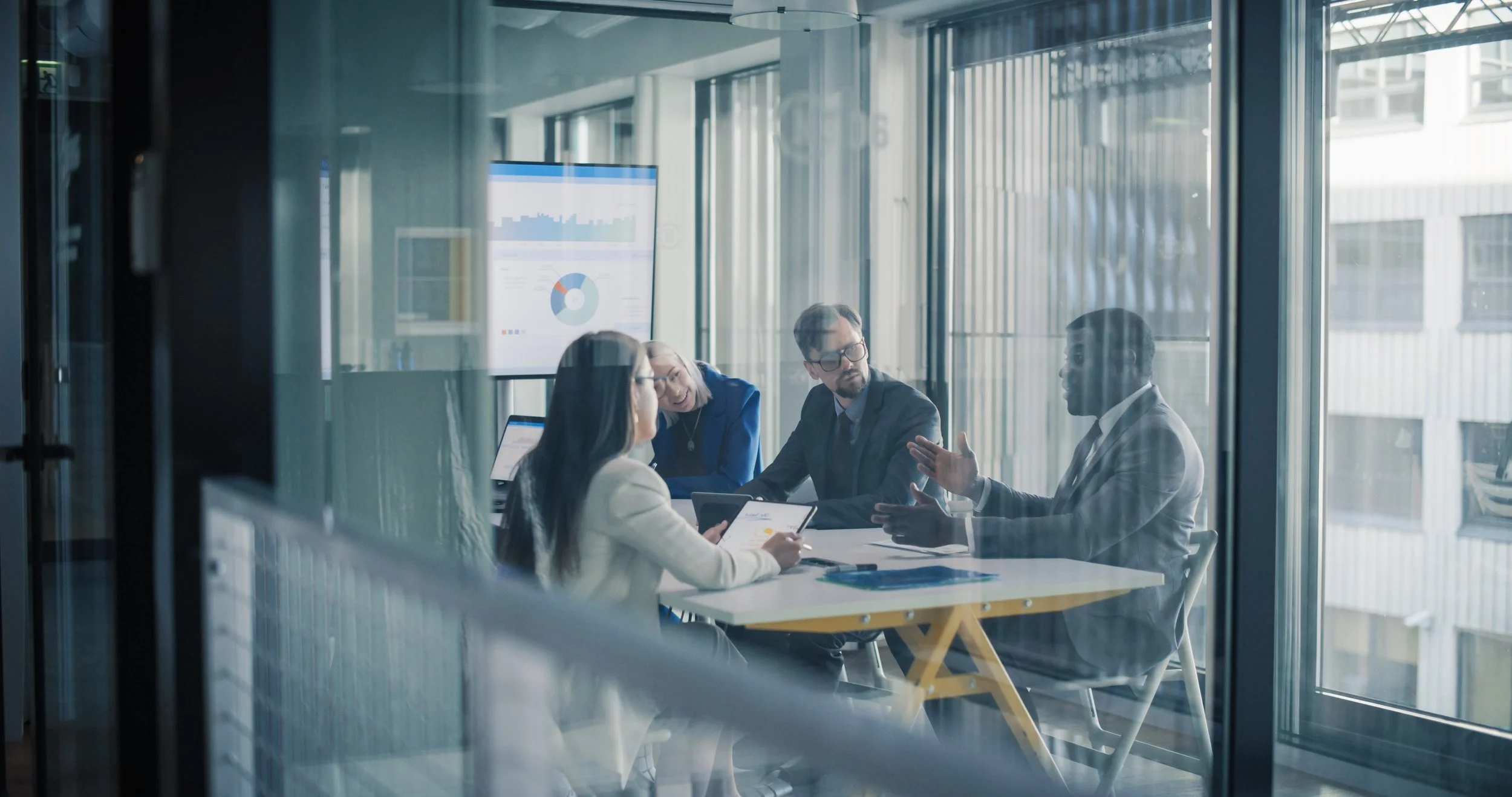 people sitting around a table talking