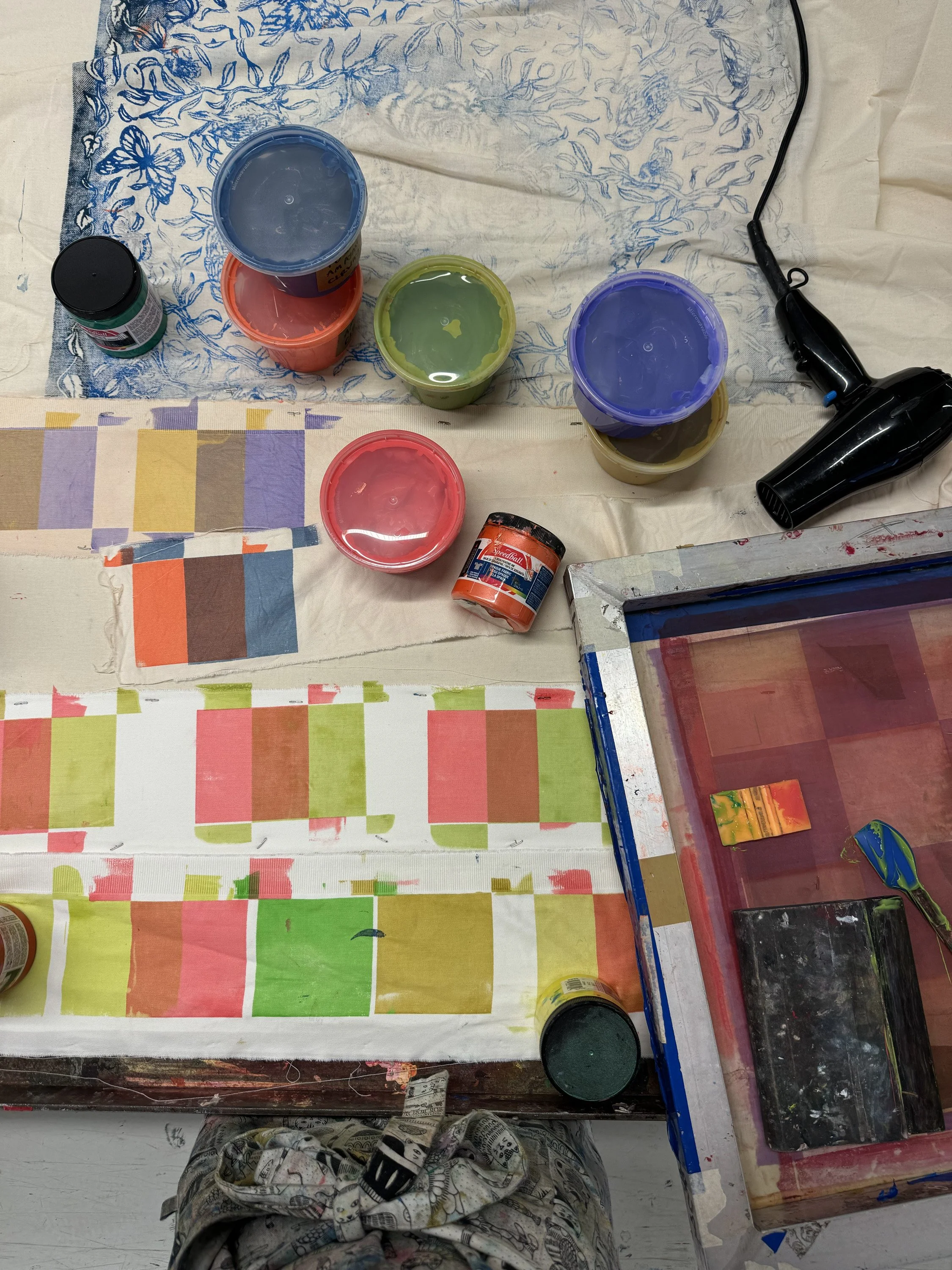 Mixing inks in a silkscreen studio.