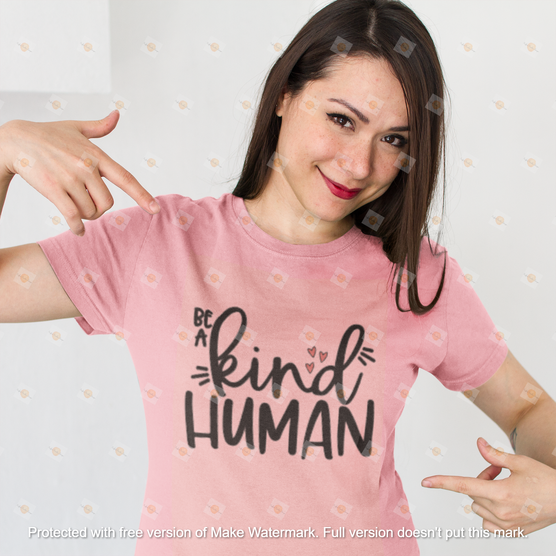 smiling-customer-showing-her-new-t-shirt-mockup-against-a-white-background-a15529.png