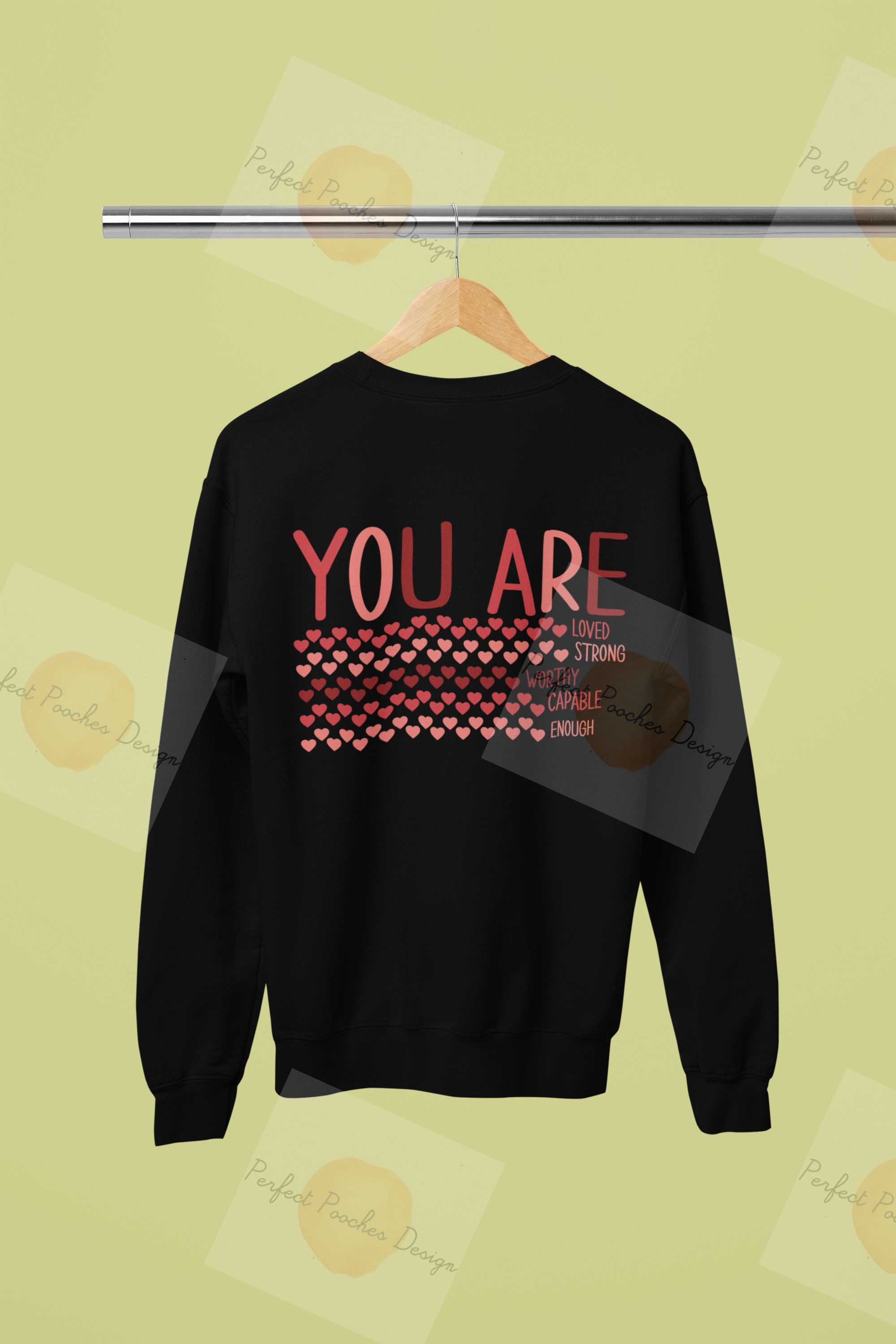 mockup-of-a-rounded-neck-gildan-sweatshirt-placed-on-a-wooden-hanger-m37117.png