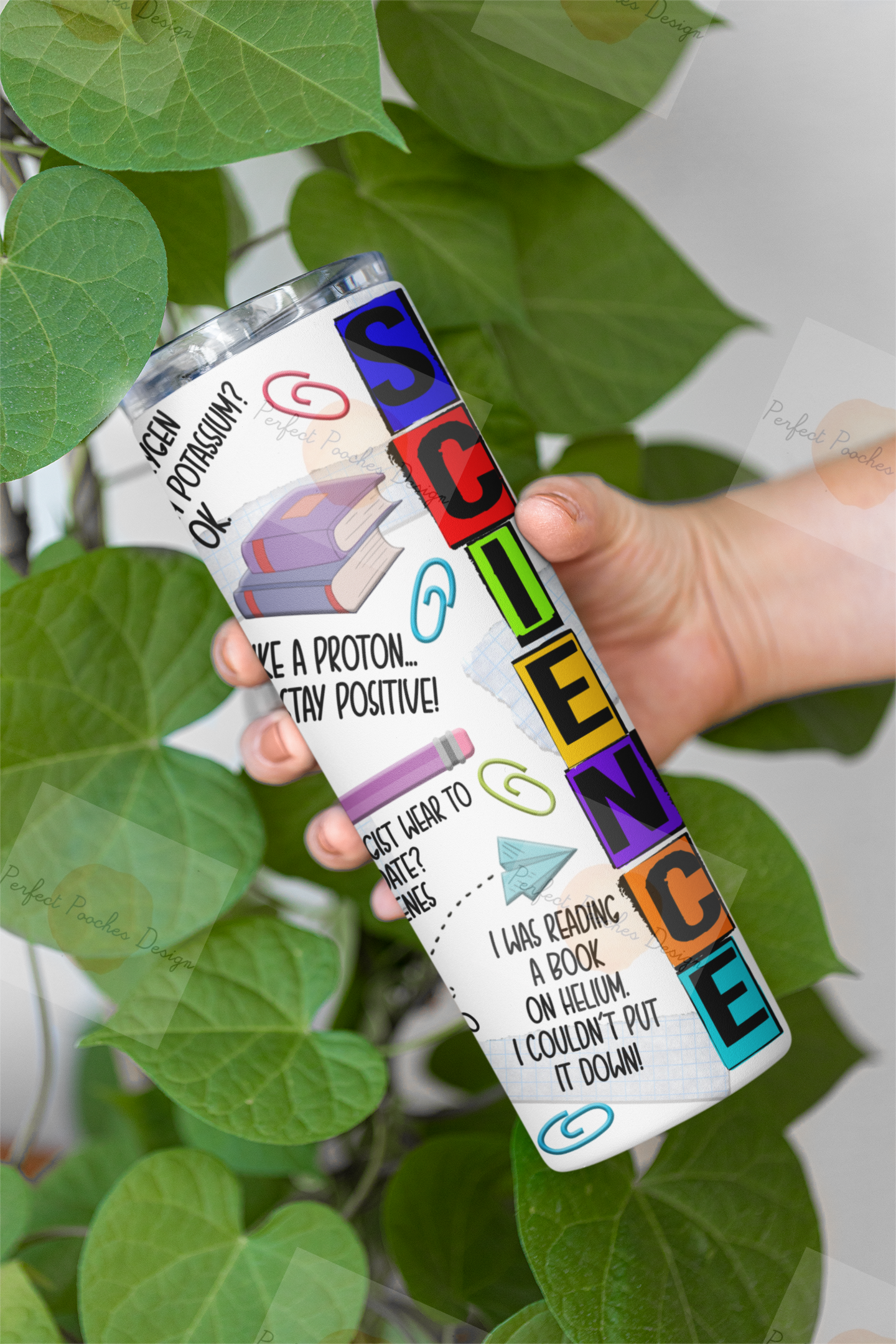 mockup-of-a-skinny-tumbler-being-held-by-a-woman-featuring-some-leaves-m21472.png