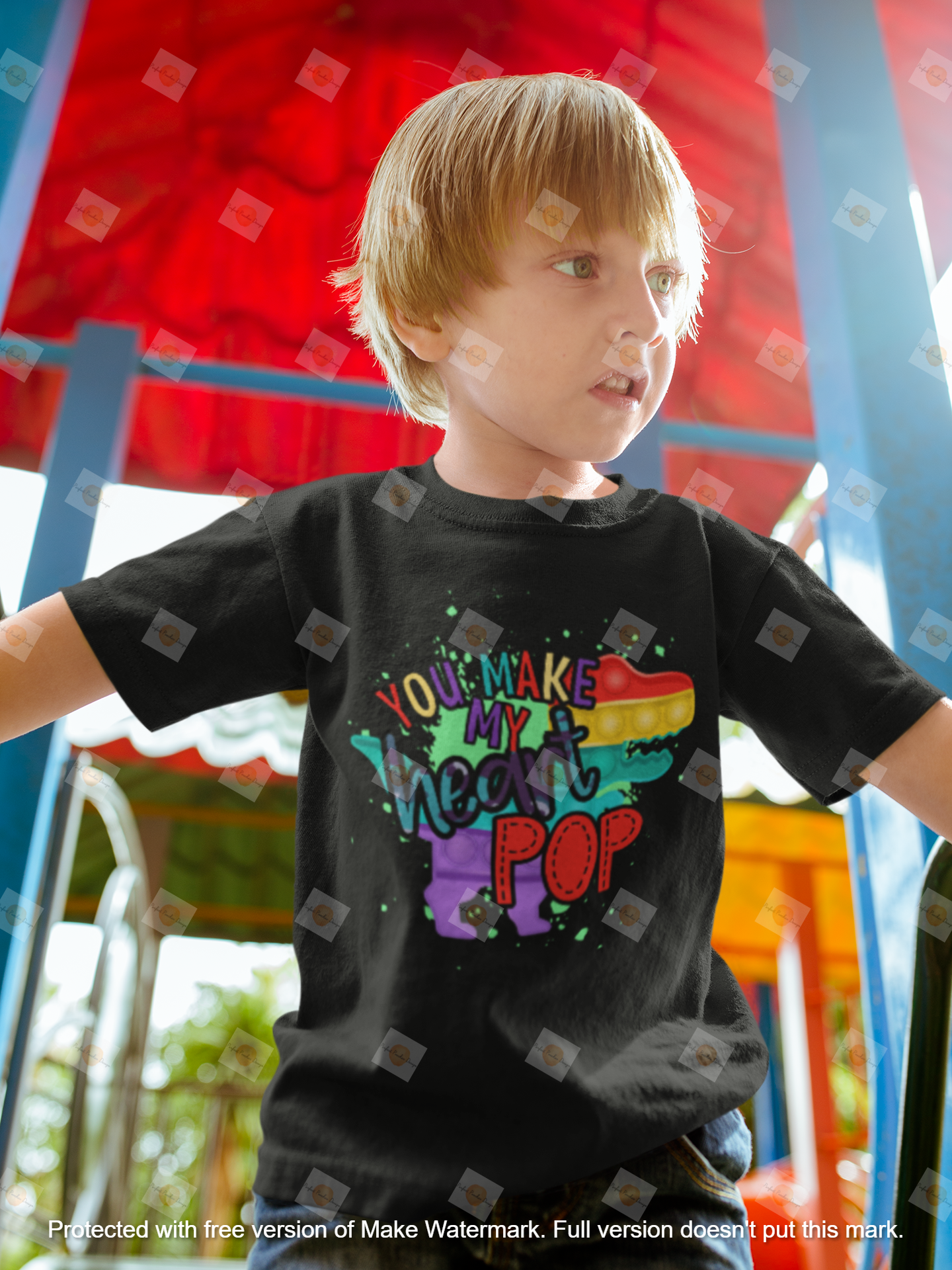 blonde-kid-wearing-a-tshirt-mockup-while-at-the-playground-a17950.png