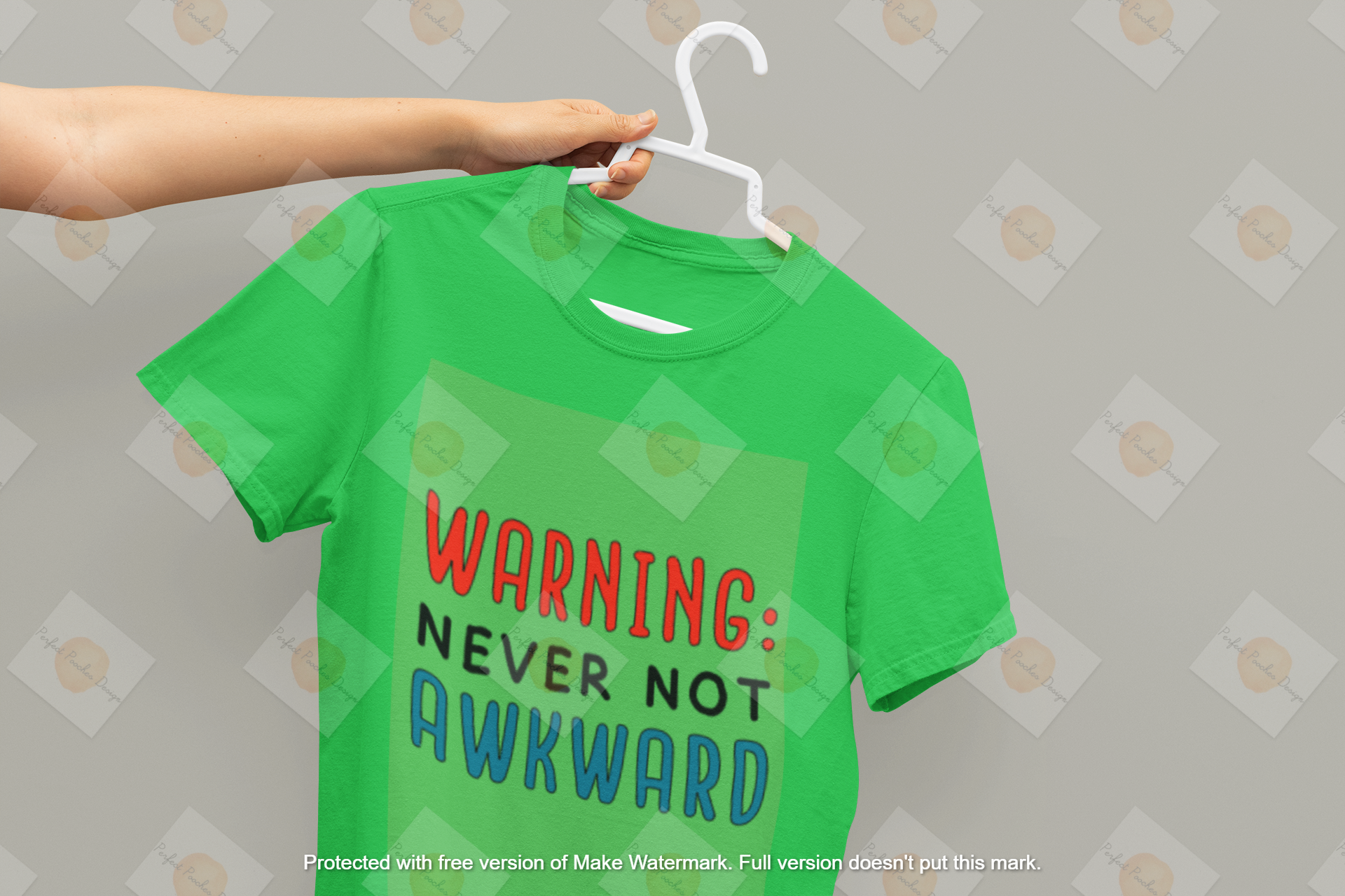 mockup-of-a-person-holding-a-hanger-with-a-t-shirt-33954.png