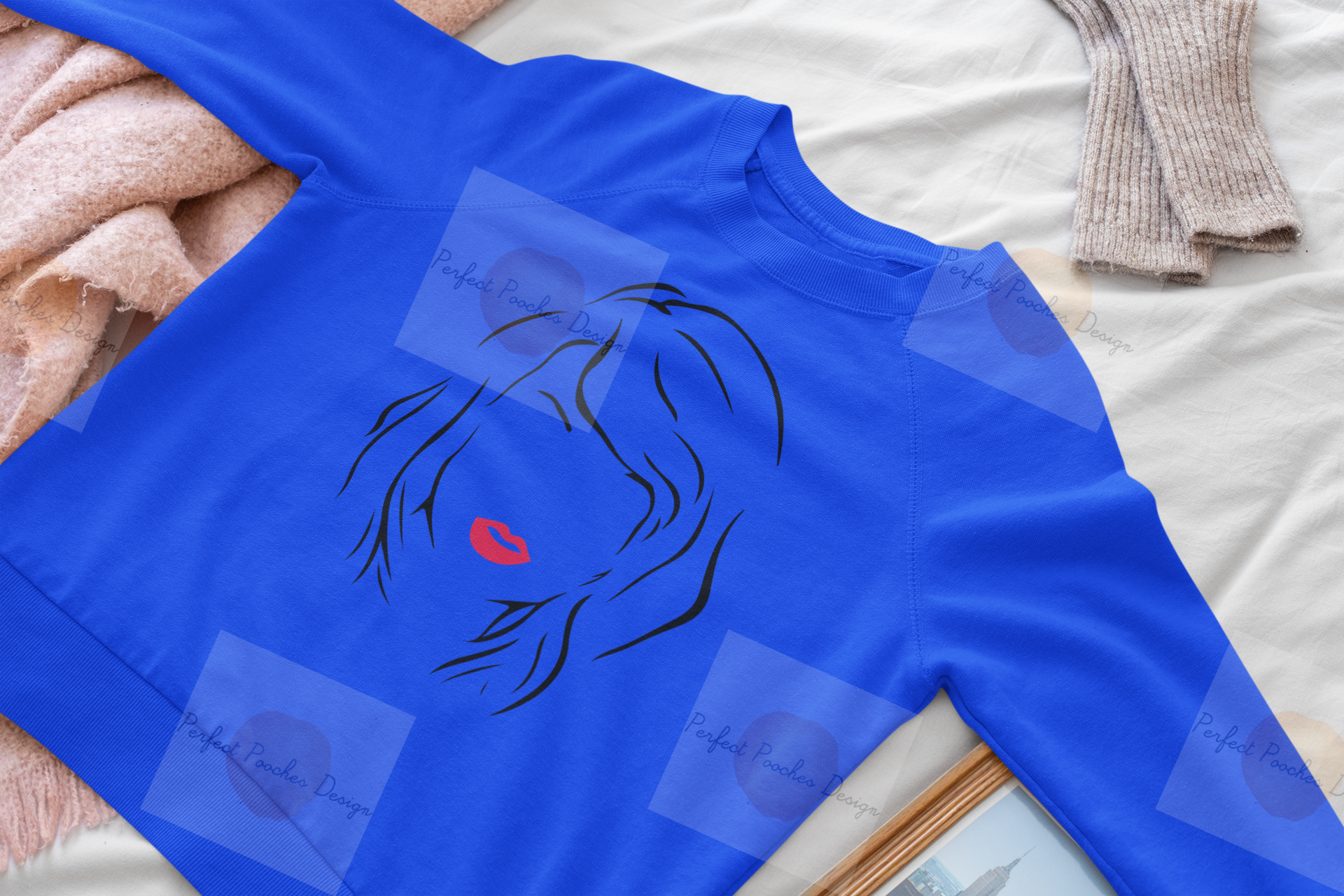 mockup-of-a-woman-s-crewneck-sweatshirt-lying-on-a-bed-33746.png