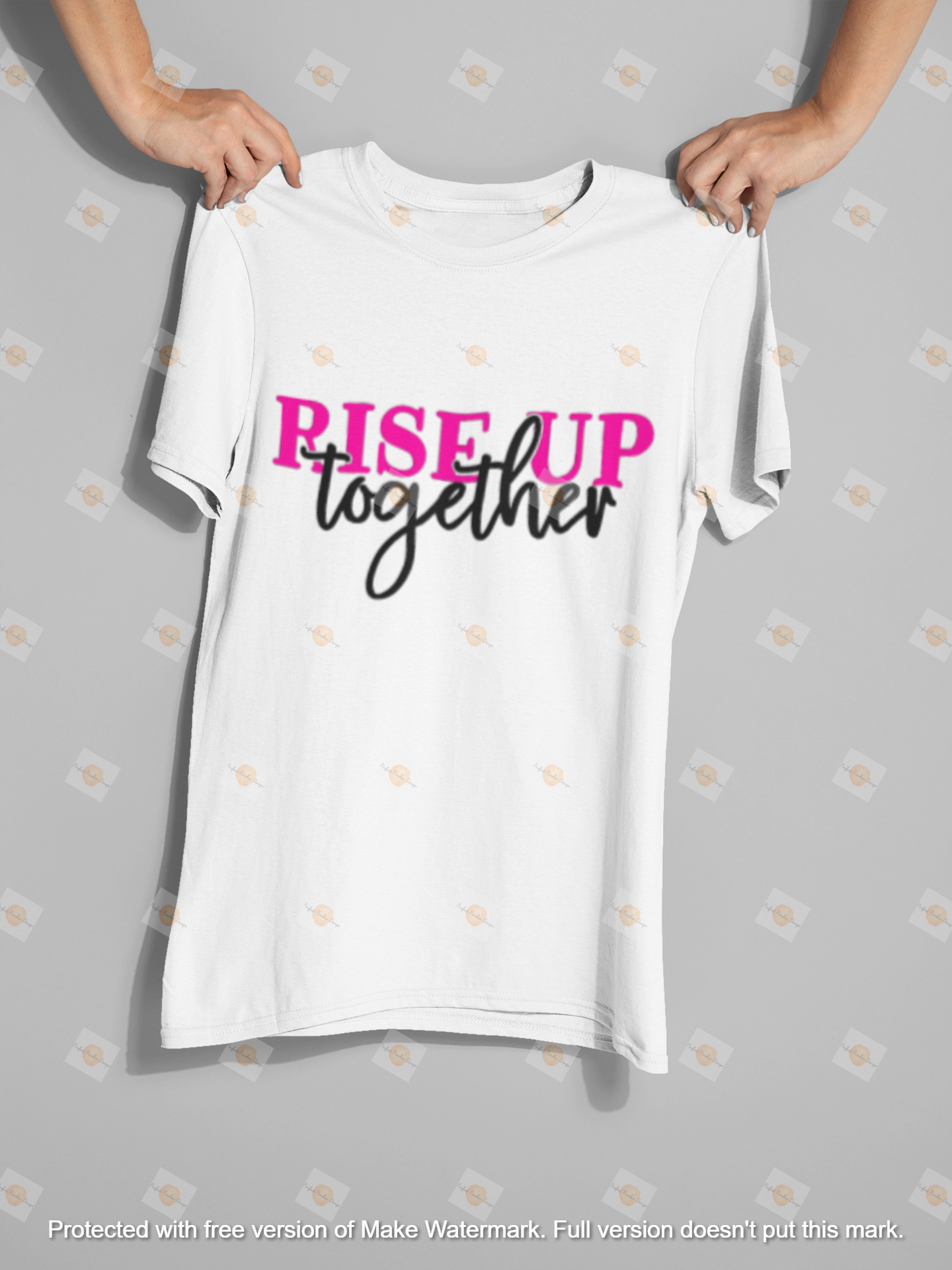 mockup-of-two-hands-holding-a-t-shirt-26737.png