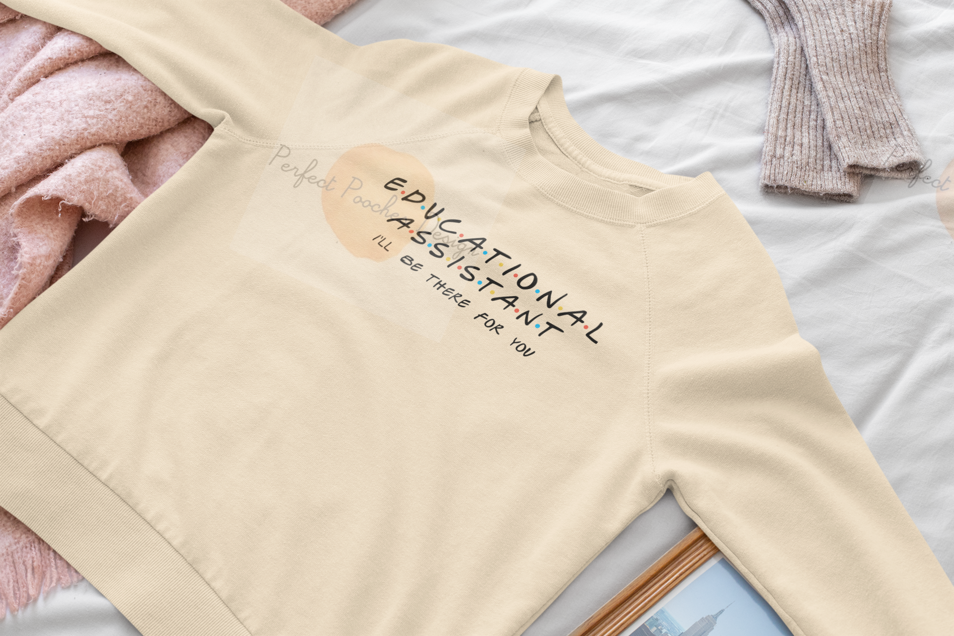 mockup-of-a-woman-s-crewneck-sweatshirt-lying-on-a-bed-33746.png