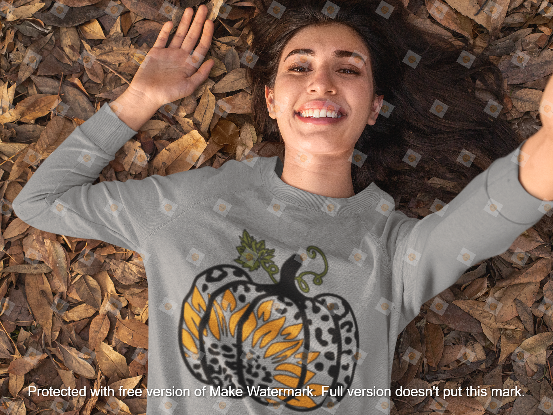 crewneck-sweatshirt-mockup-of-a-woman-taking-a-selfie-while-lying-on-some-autumn-leaves-31811.png