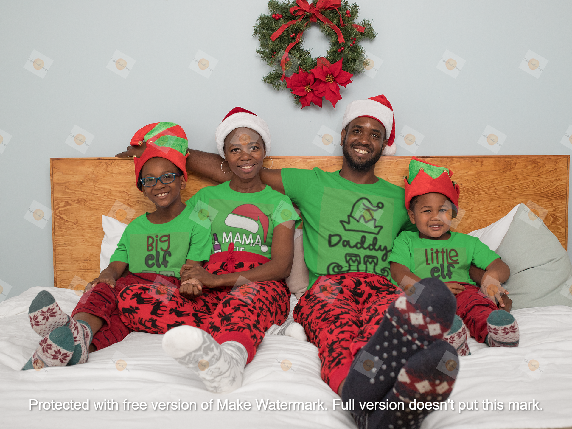 x-mas-mockup-of-a-family-with-matching-t-shirts-in-the-bedroom-30360.png