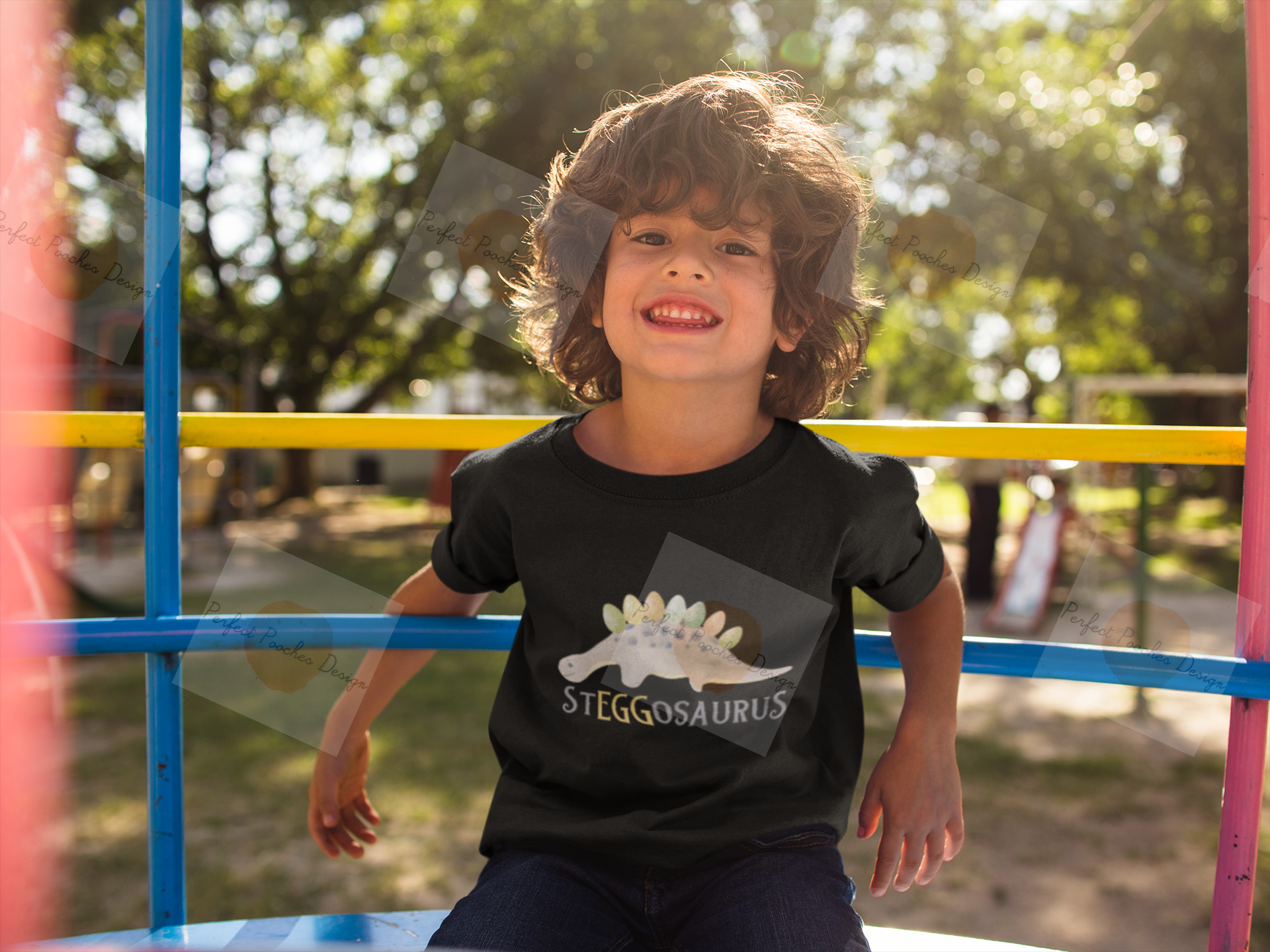 happy-small-boy-wearing-a-t-shirt-mockup-while-at-the-park-a17871.png