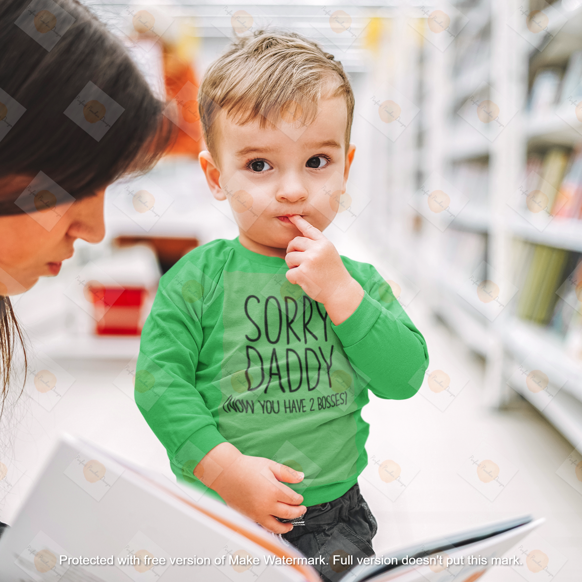 long-sleeve-tee-mockup-of-a-sweet-toddler-at-a-book-store-46359-r-el2.png