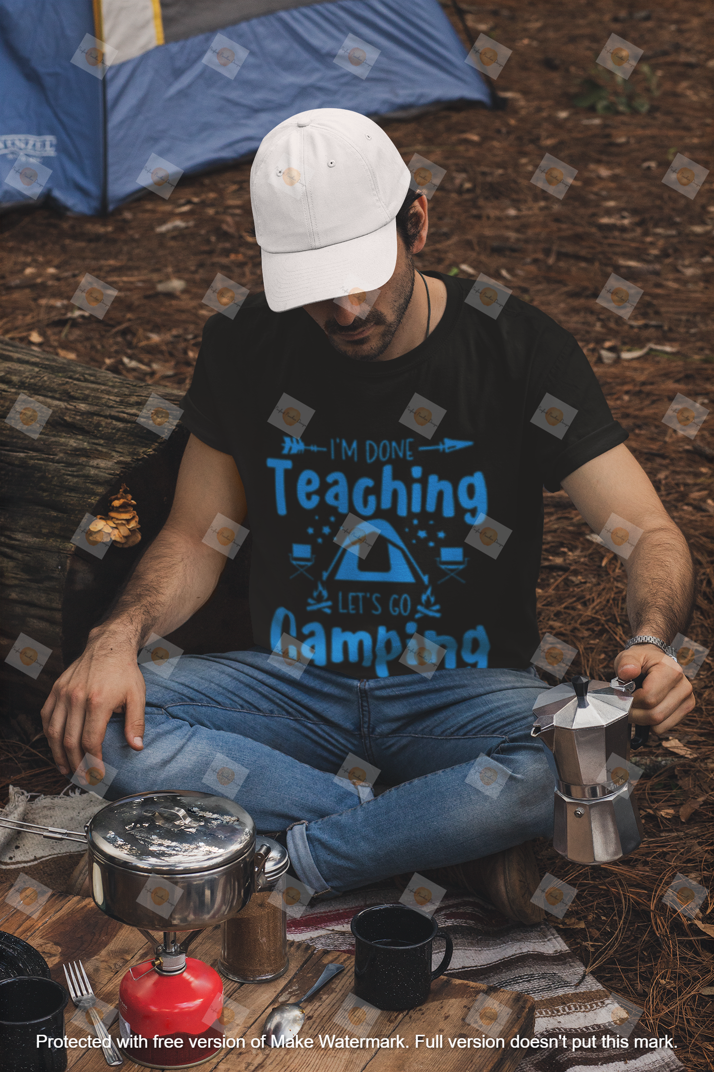 t-shirt-and-dad-hat-mockup-of-a-man-making-coffee-in-a-camping-site-30476.png