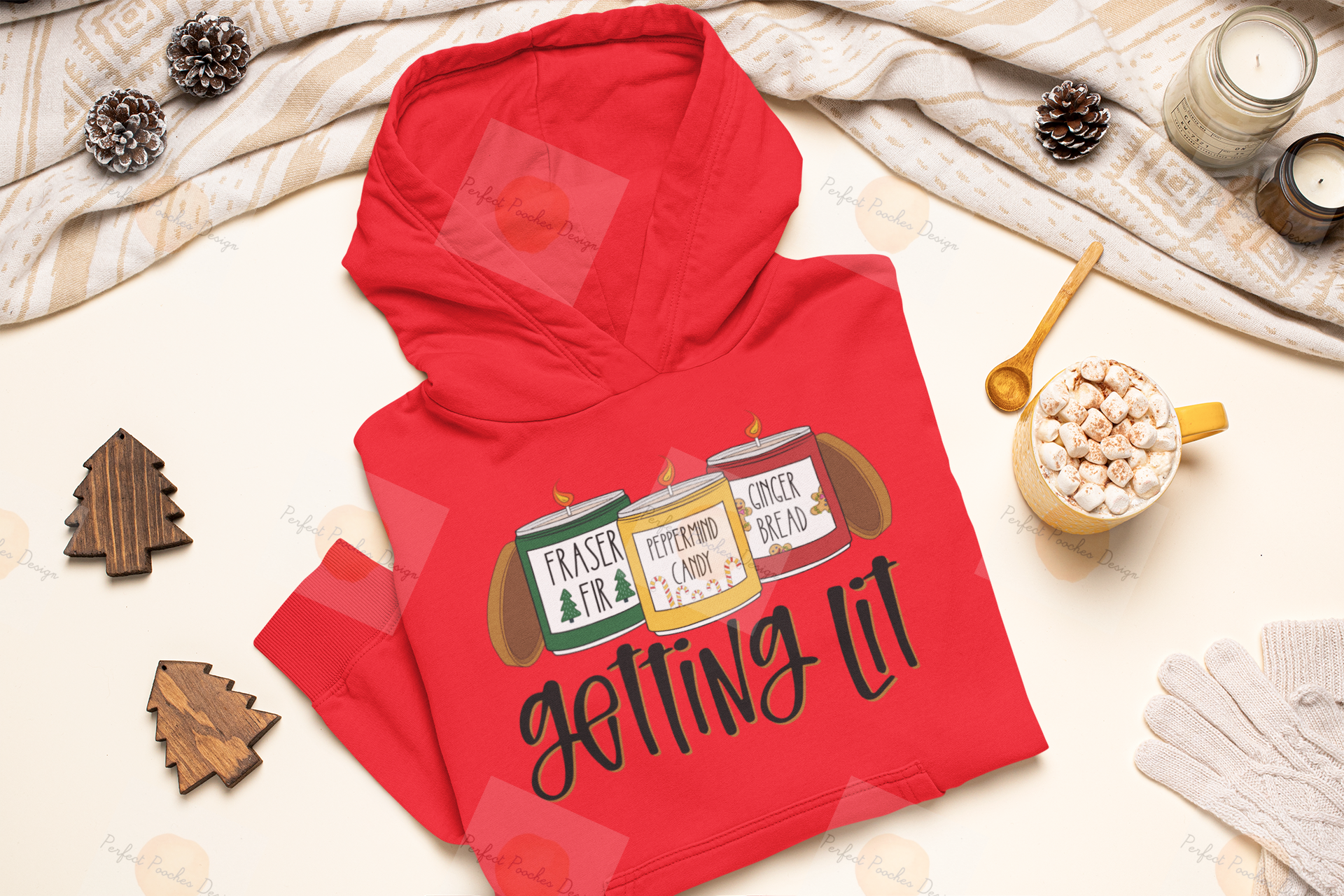 christmas-mockup-featuring-a-folded-pullover-hoodie-placed-by-some-ornaments-m144.png