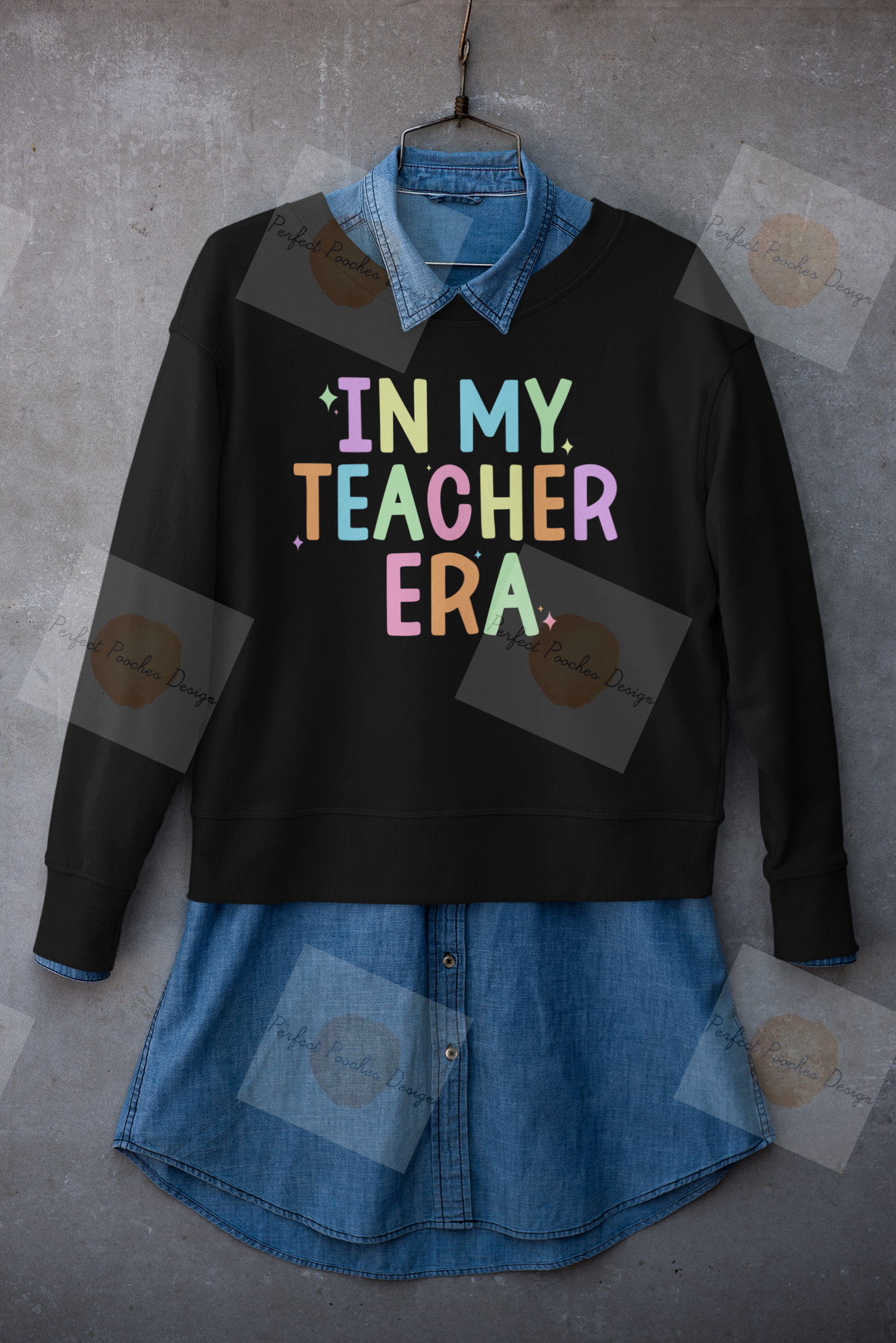 mockup-of-a-crewneck-sweatshirt-placed-on-a-hanger-with-a-denim-garment-33981.png