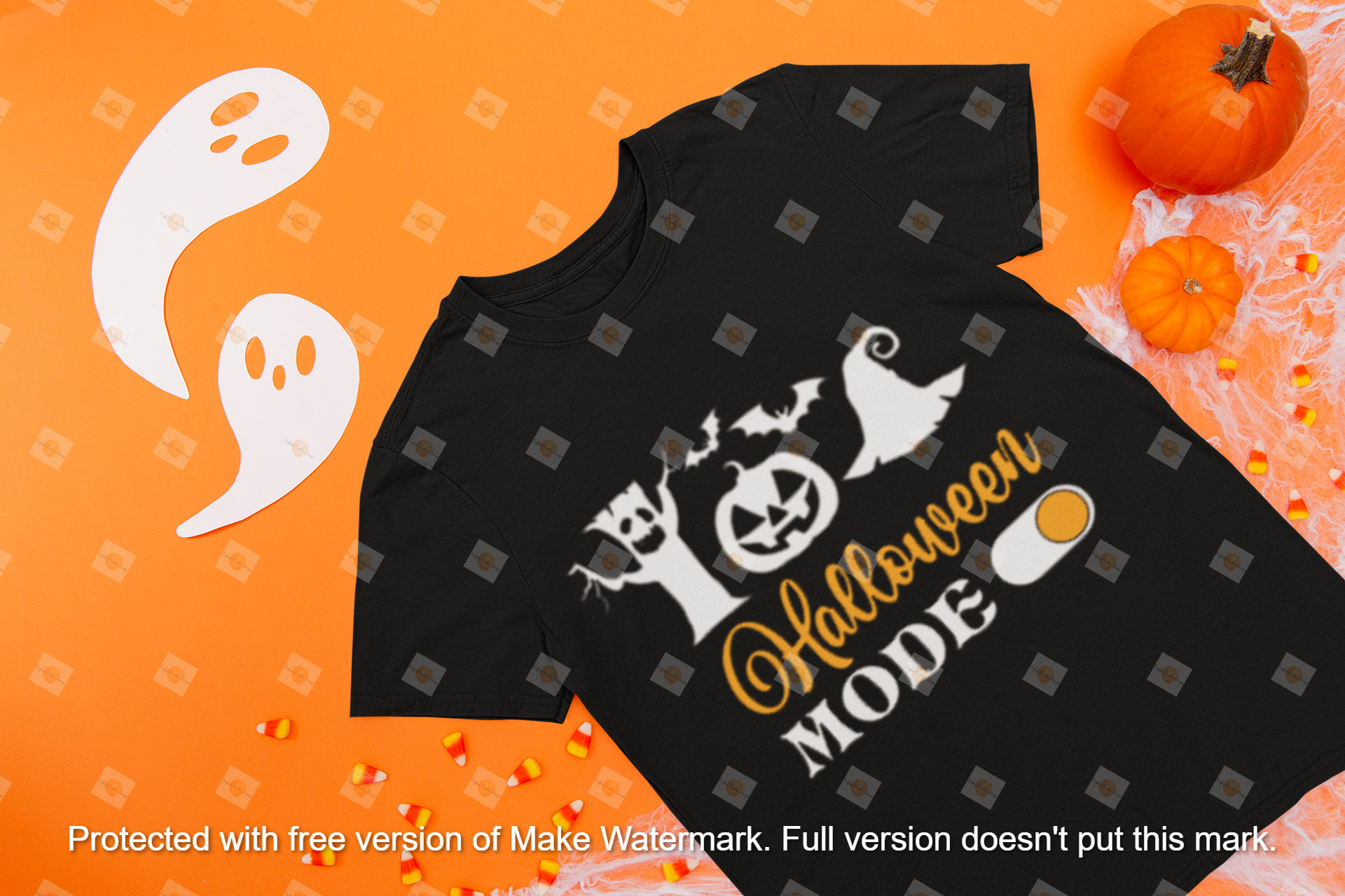 mockup-of-a-flat-laid-t-shirt-on-a-surface-with-halloween-items-m109.png