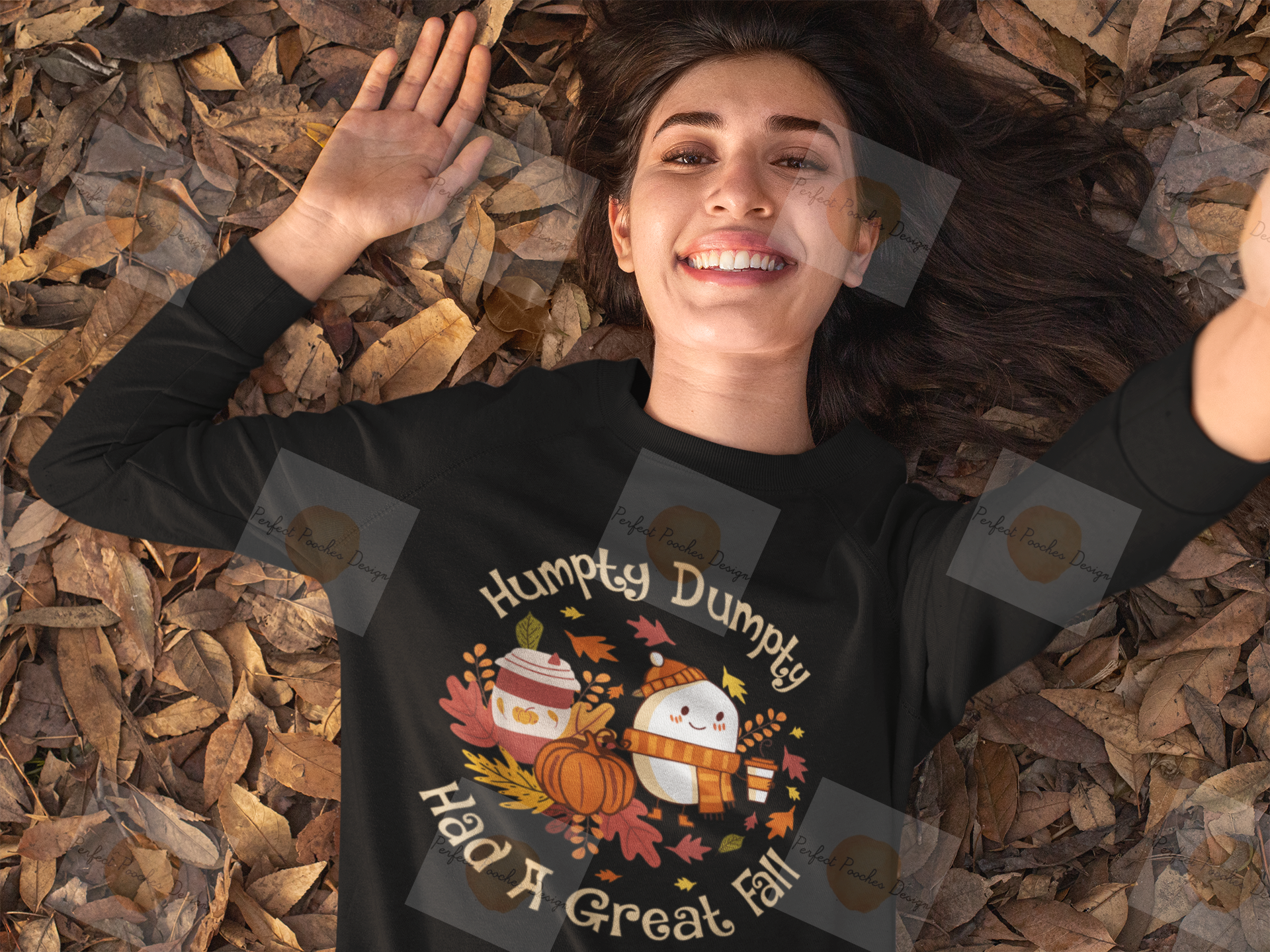 crewneck-sweatshirt-mockup-of-a-woman-taking-a-selfie-while-lying-on-some-autumn-leaves-31811.png