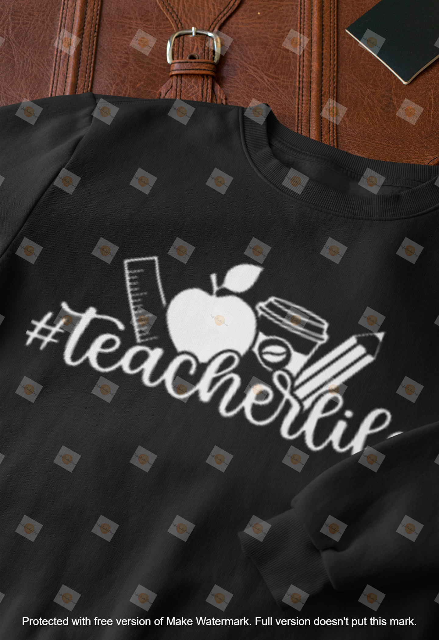 closeup-mockup-of-a-crewneck-sweatshirt-next-to-a-briefcase-33716.png