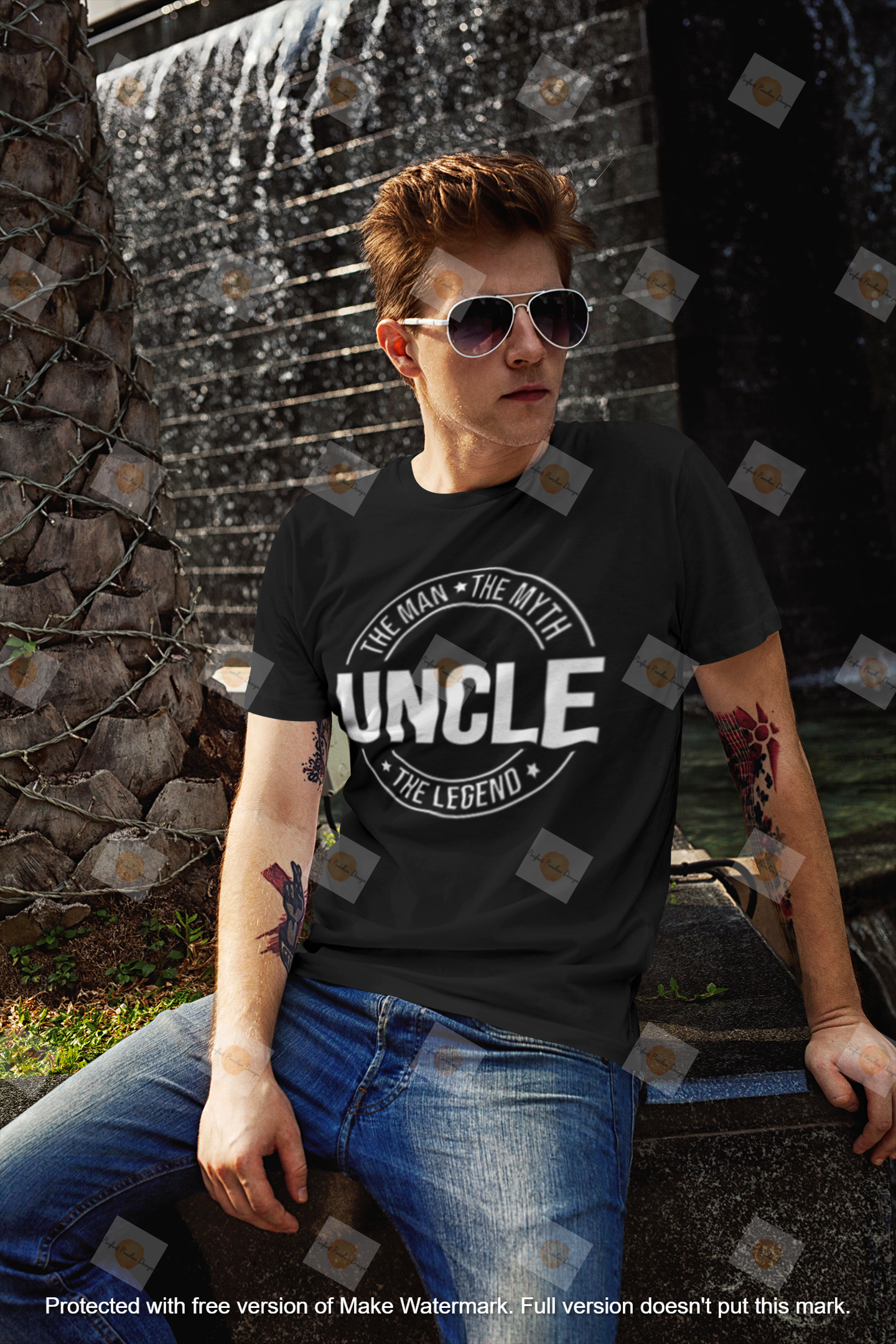 t-shirt-mockup-of-a-red-haired-man-posing-next-to-a-fountain-2191-el1.png