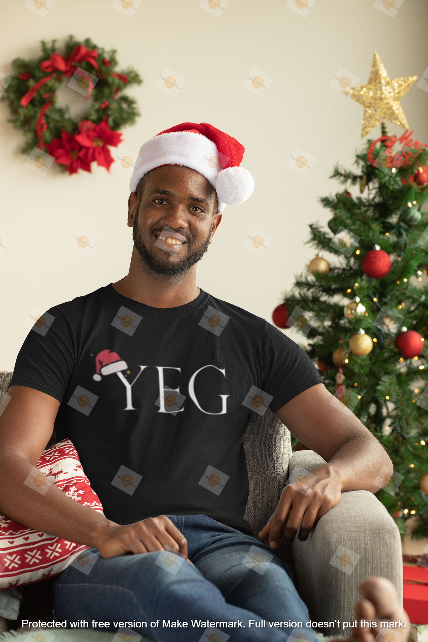 mockup-of-a-man-with-a-crewneck-t-shirt-sitting-next-to-a-christmas-tree-30344.png