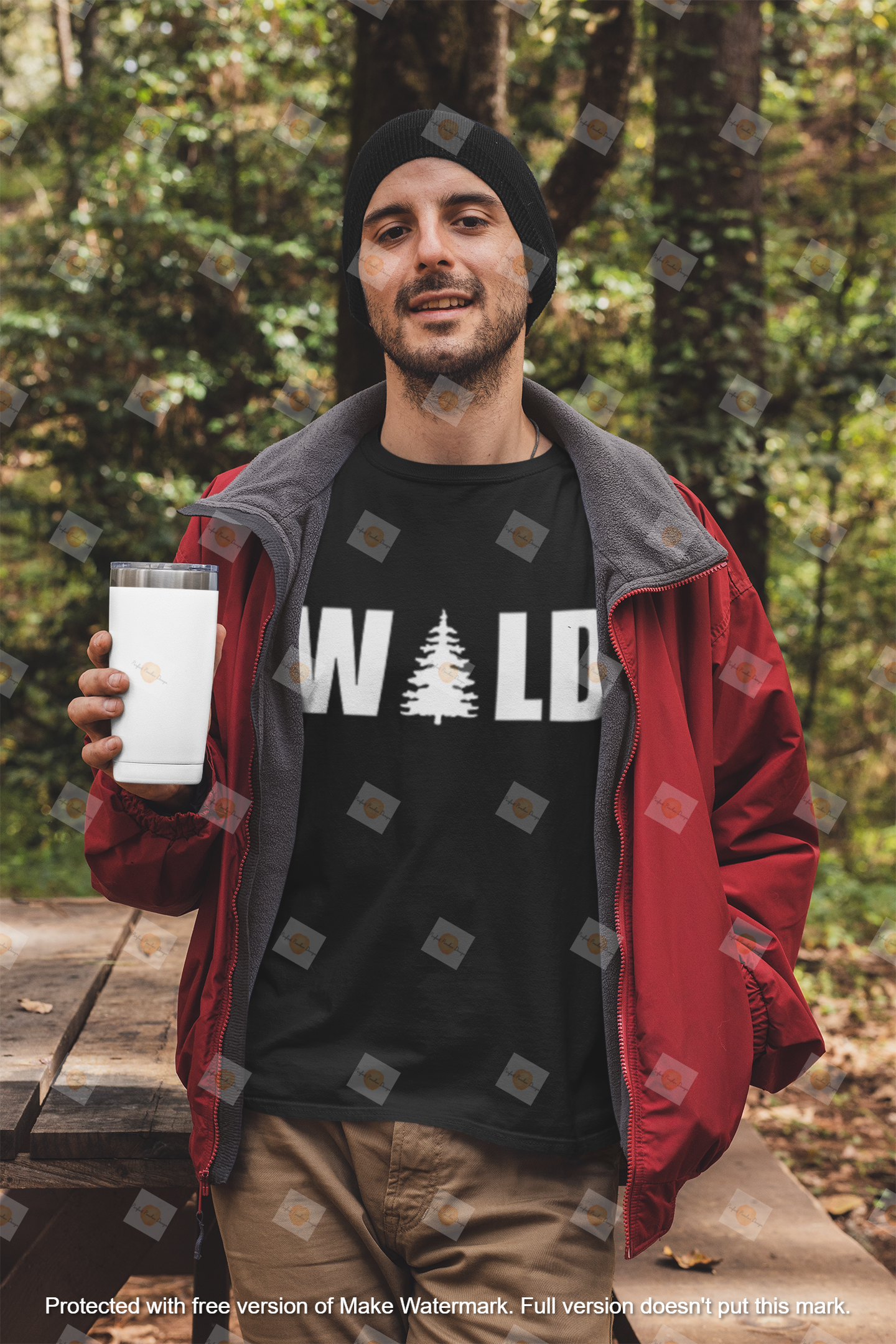 t-shirt-mockup-featuring-a-man-holding-a-20-oz-travel-mug-in-the-woods-30486.png
