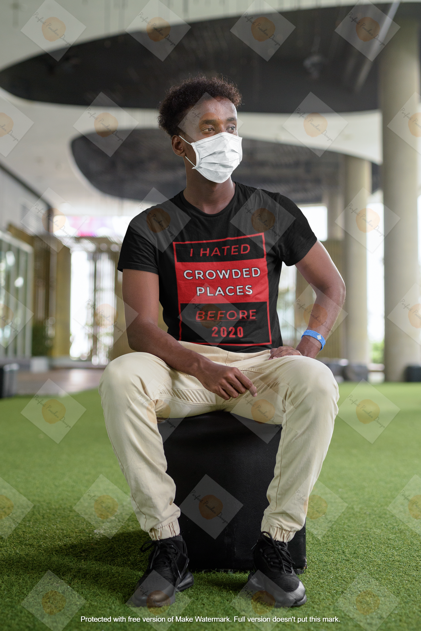 mockup-of-a-man-sitting-on-a-stool-while-wearing-a-face-mask-and-a-tee-m10308-r-el2.png