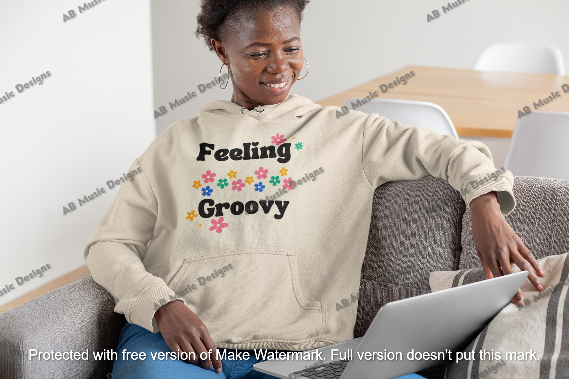 mockup-of-a-short-haired-woman-with-a-hoodie-working-at-home-30337.png