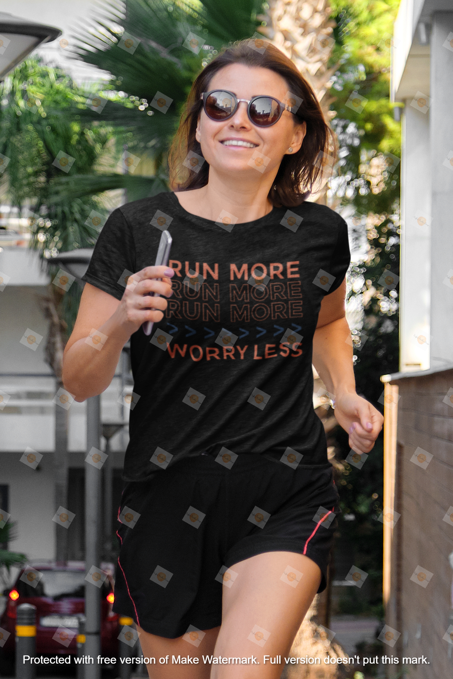 mockup-of-a-happy-woman-running-in-an-urban-area-while-wearing-a-heather-tee-m21570-r-el2.png