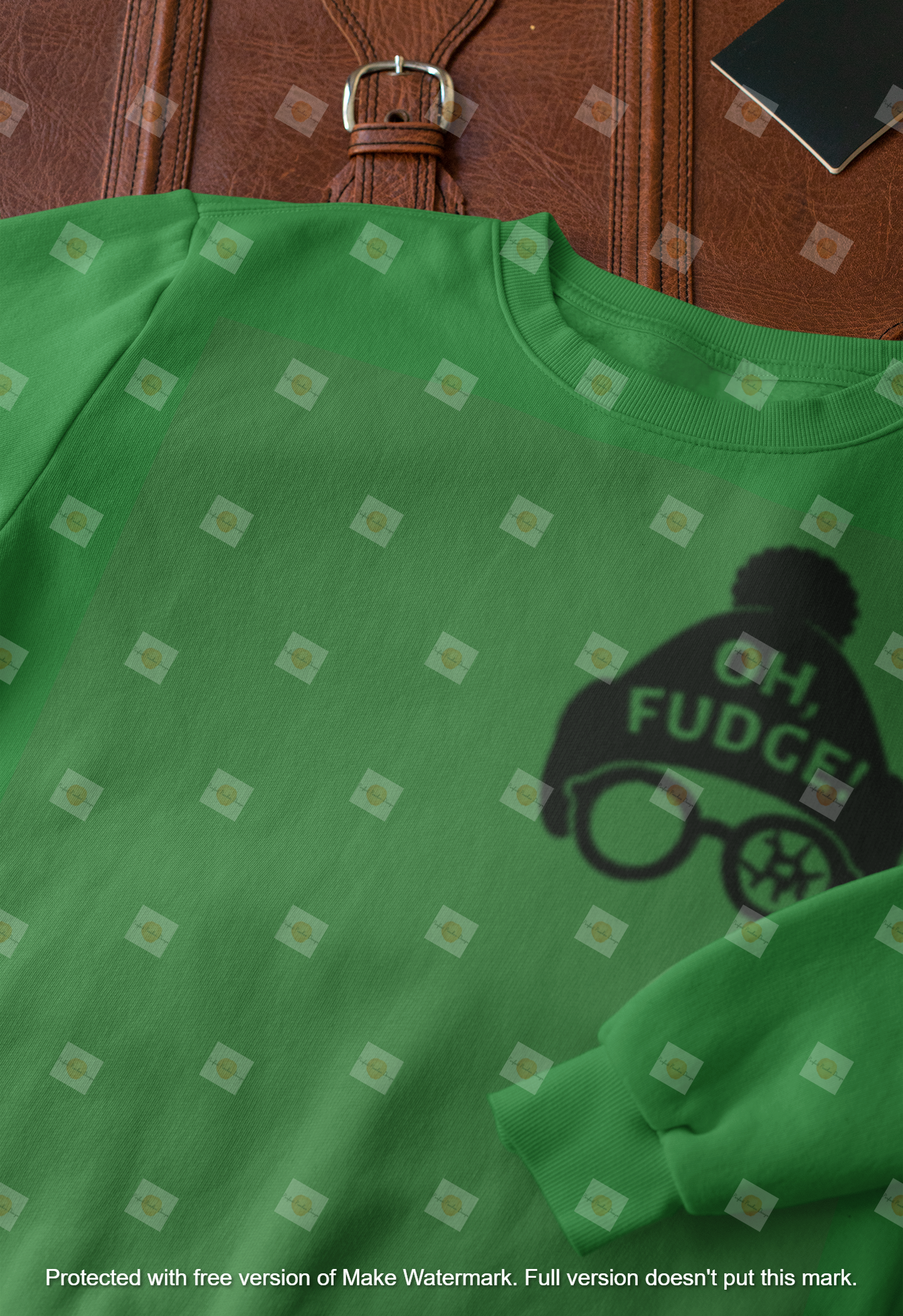 closeup-mockup-of-a-crewneck-sweatshirt-next-to-a-briefcase-33716.png