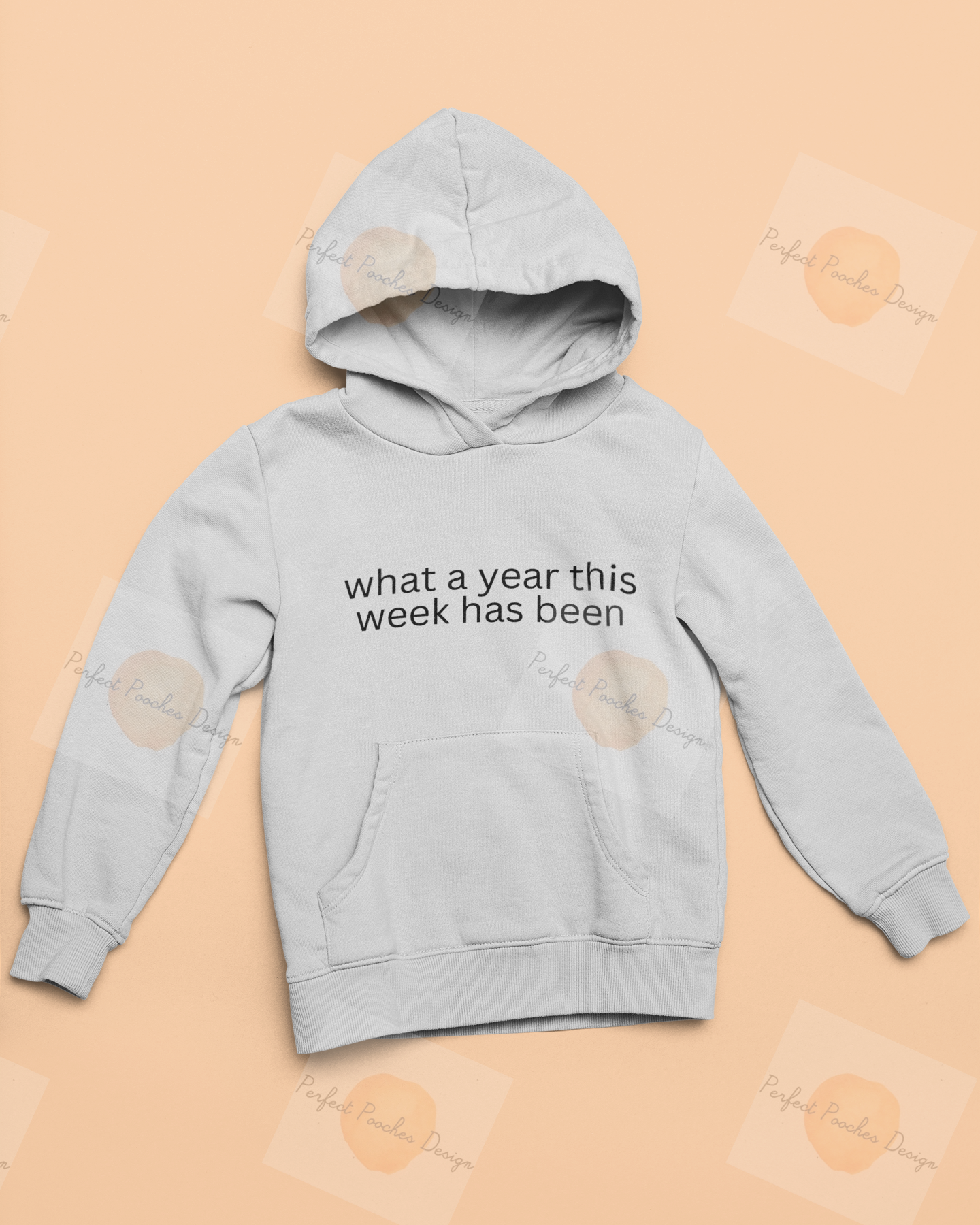 mockup-of-a-pullover-hoodie-placed-against-a-solid-surface-33891.png