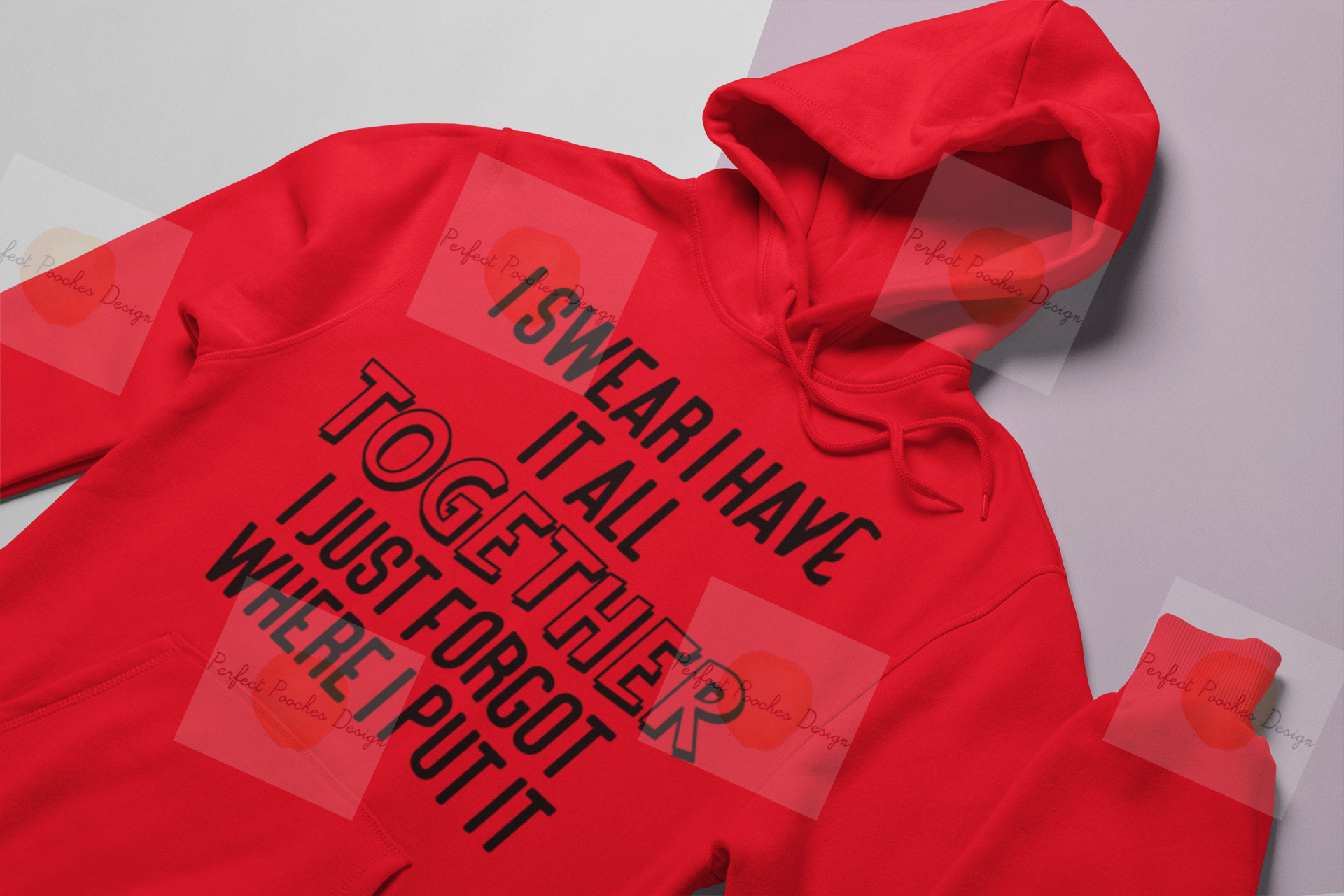mockup-of-a-hoodie-lying-over-a-surface-with-two-colors-24257.png