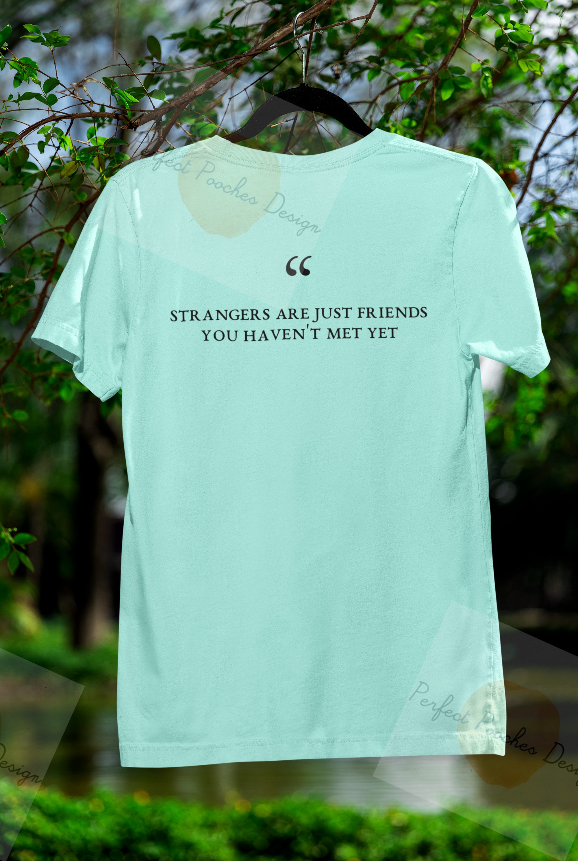 mockup-of-a-bella-canvas-t-shirt-placed-on-a-hanger-in-a-nature-setting-m39833.png