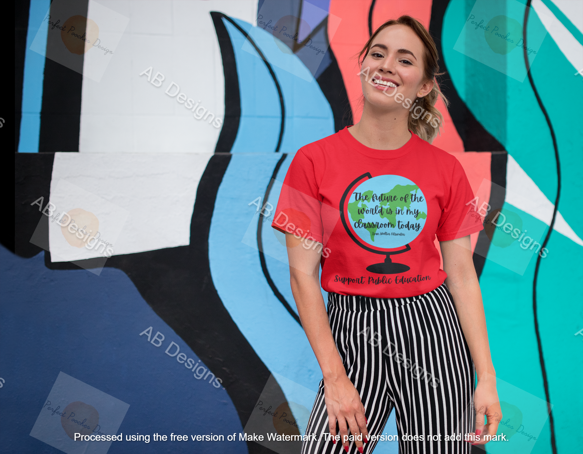 tee-mockup-of-a-smiling-girl-in-front-of-a-wall-with-colorful-illustrations-26646.png