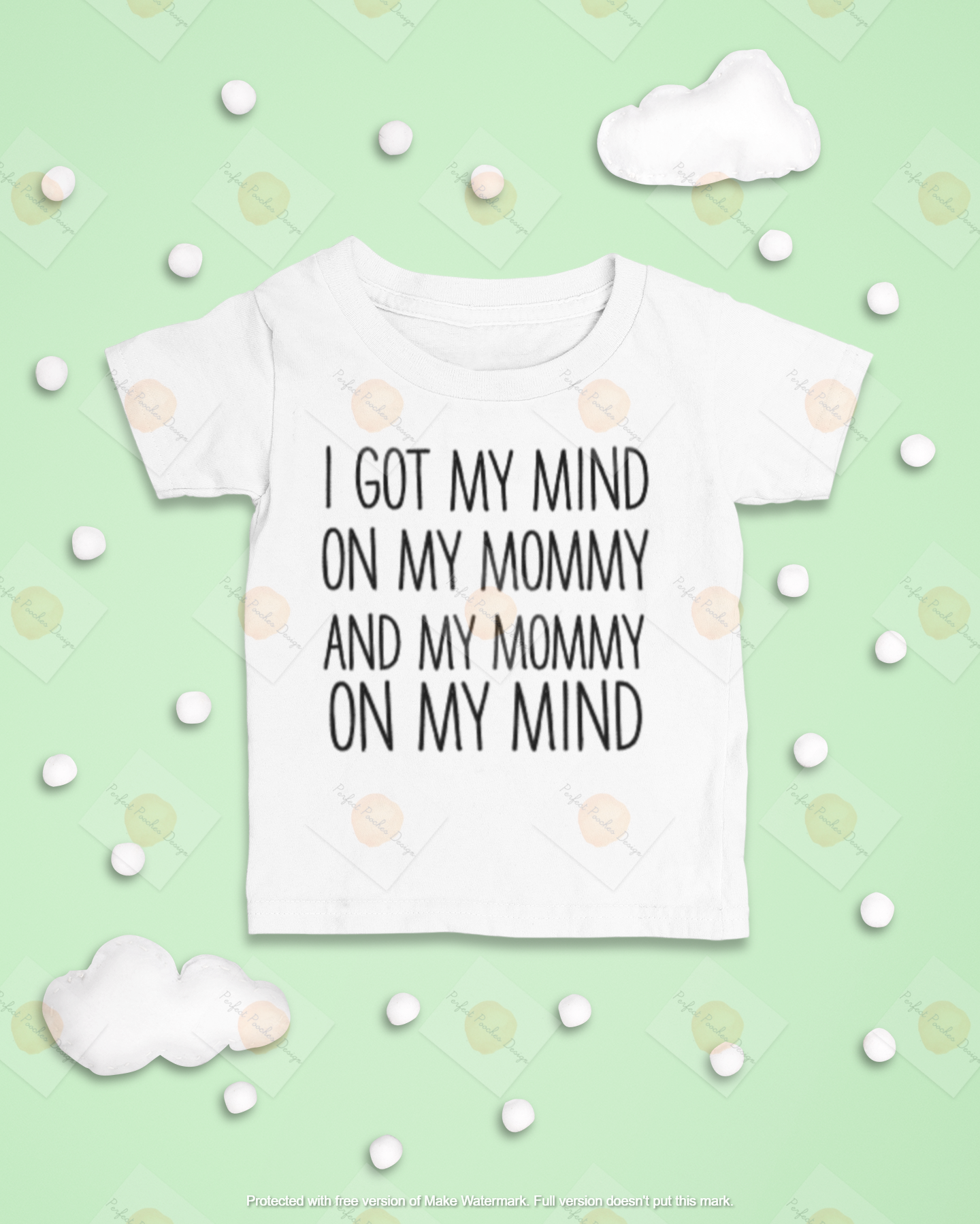 mockup-of-a-baby-s-t-shirt-laid-flat-with-snowy-clouds-as-an-ornament-m1126.png