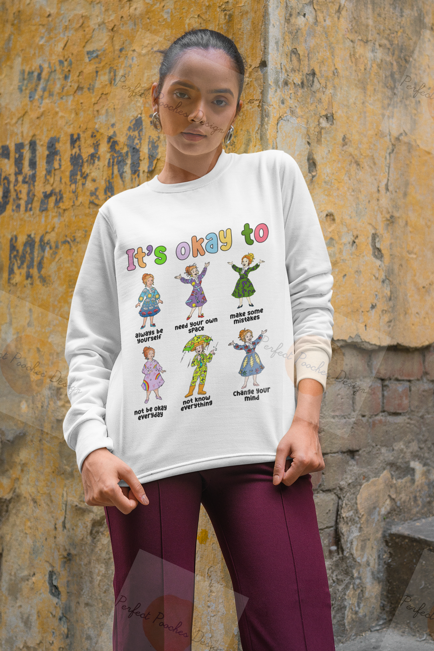 mockup-of-a-woman-in-a-crewneck-sweatshirt-posing-by-a-distressed-wall-m31392.png