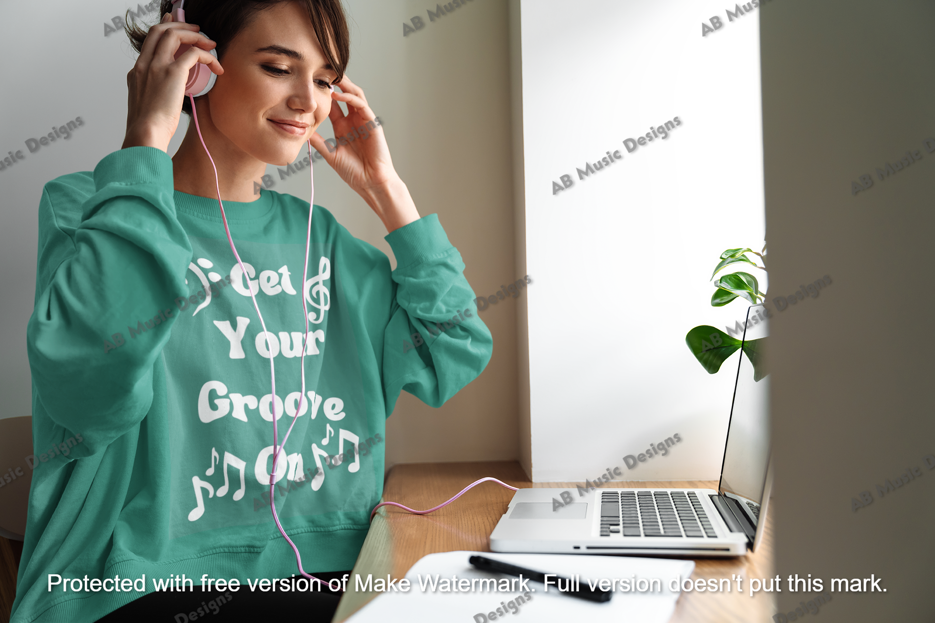 sweatshirt-mockup-of-a-woman-listening-to-music-on-her-computer-m10978-r-el2.png