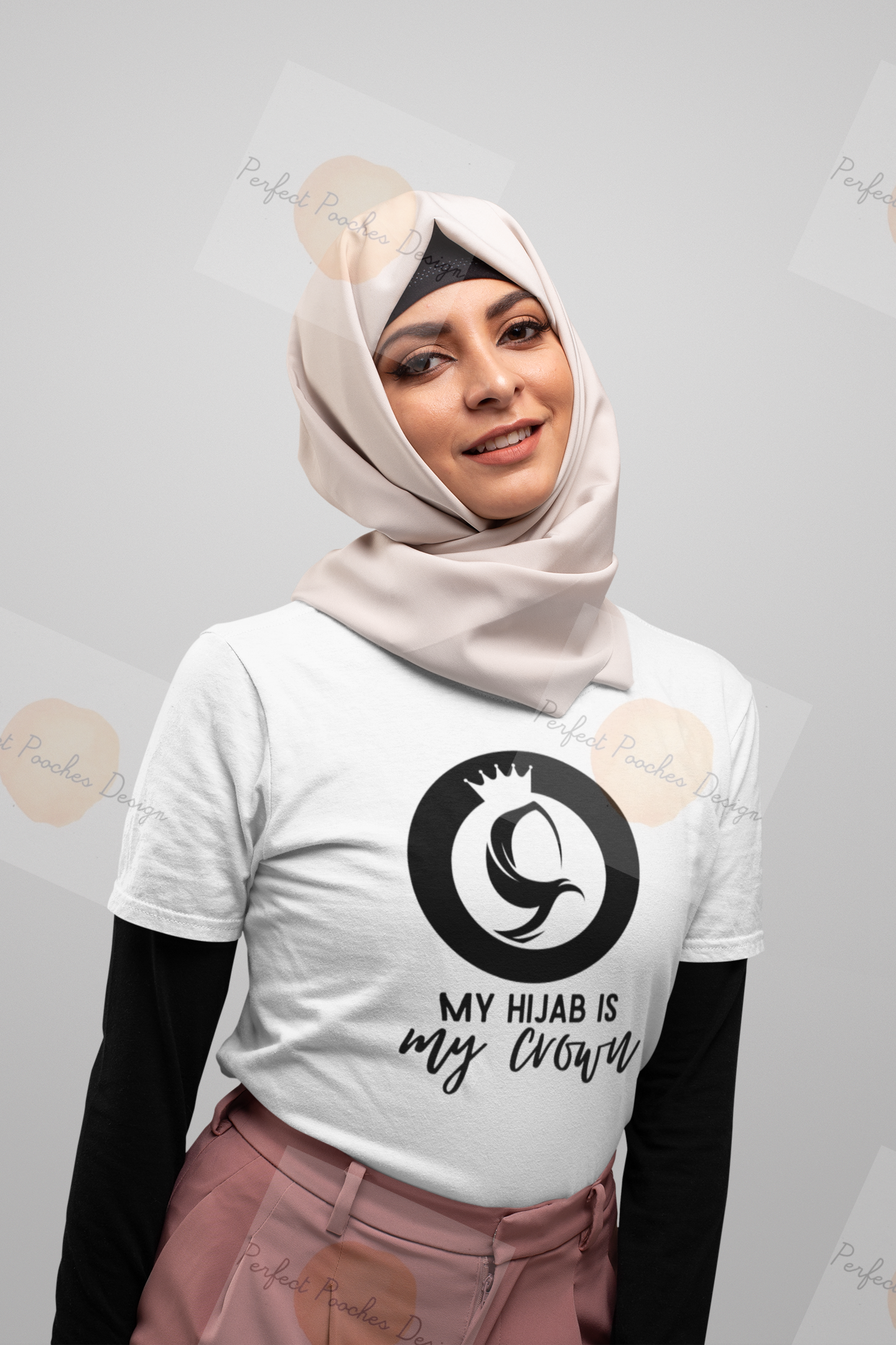 t-shirt-mockup-of-a-woman-wearing-a-hijab-with-a-plain-background-28287.png