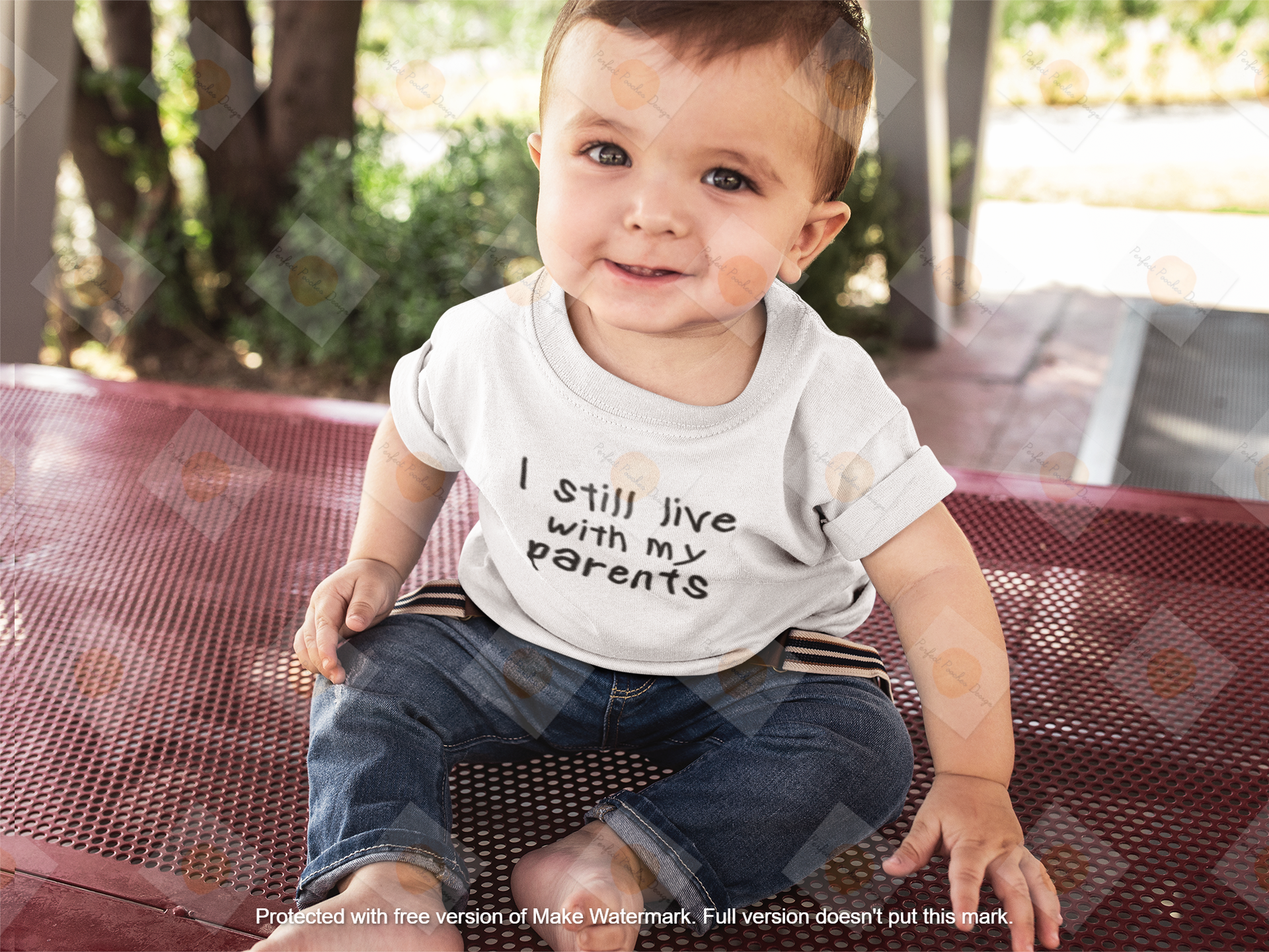 little-baby-boy-looking-to-the-camera-wearing-a-t-shirt-template-while-sitting-down-16090.png