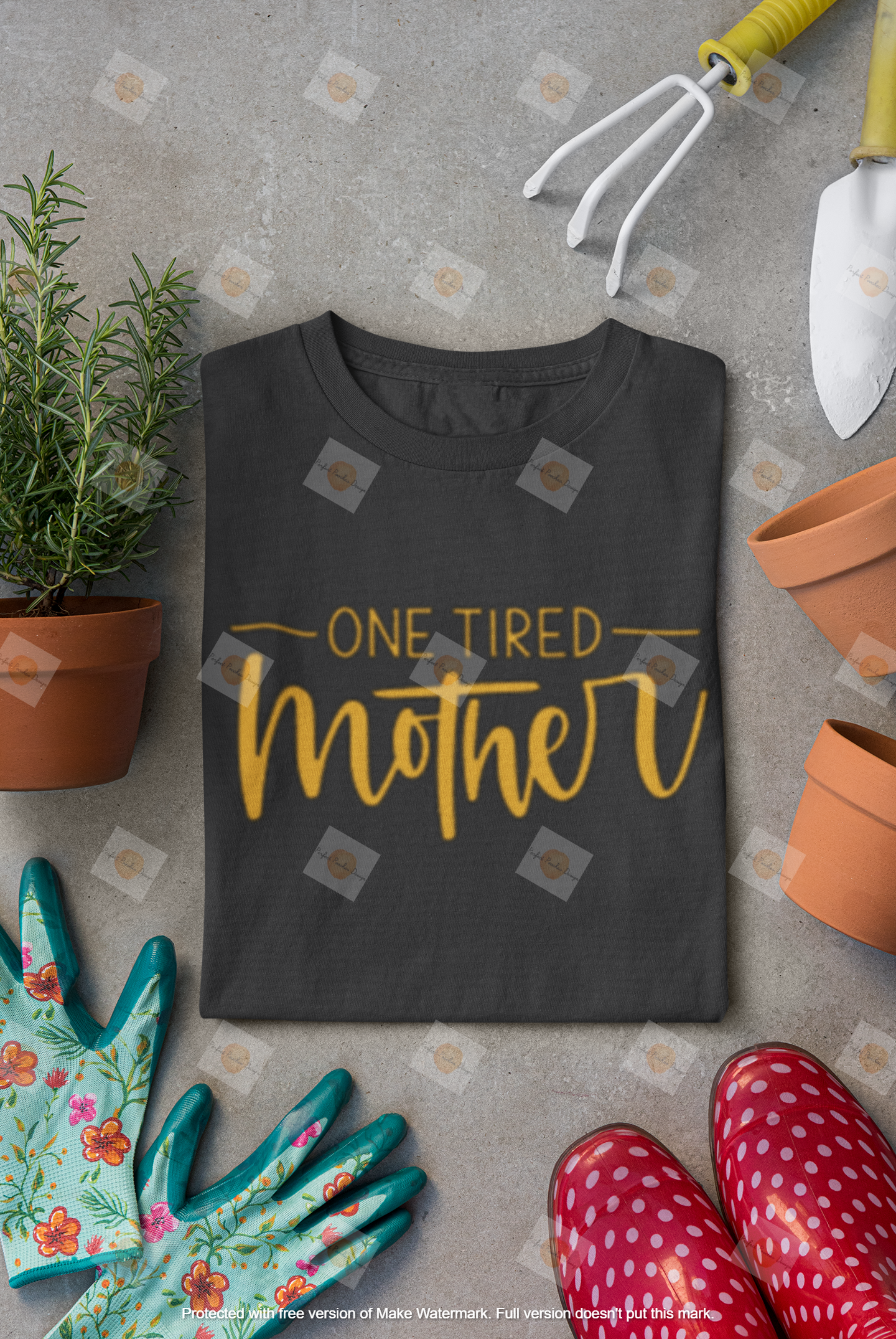 mockup-of-a-folded-t-shirt-surrounded-by-gardening-tools-33635.png